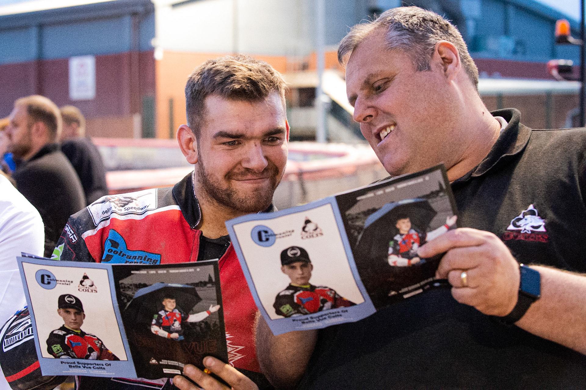 Photo: Ian Charles

Danny Phillips (left) compares programme with Steve Williams 

Belle Vue Colts v Leicester Cubs, SGB National League, Belle Vue National Speedway Stadium, Manchester, Thursday 8  August  2019