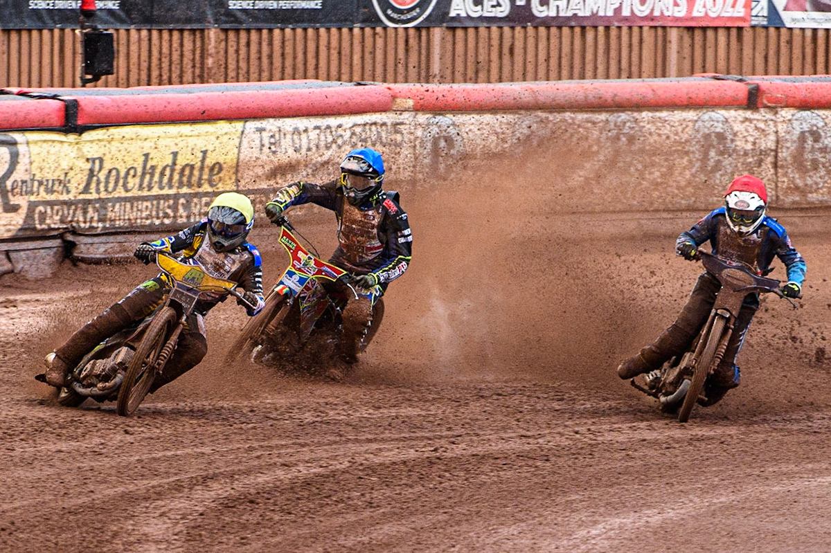 Ben Barker (Yellow) leads as Richard Lawson (Red) and Simon Lambert (Blue) struggle on the heavy track during the Sports Insure British Speedway Final at the National Speedway Stadium, Manchester on Monday 14th August 2023. (Photo: Ian Charles | MI News)