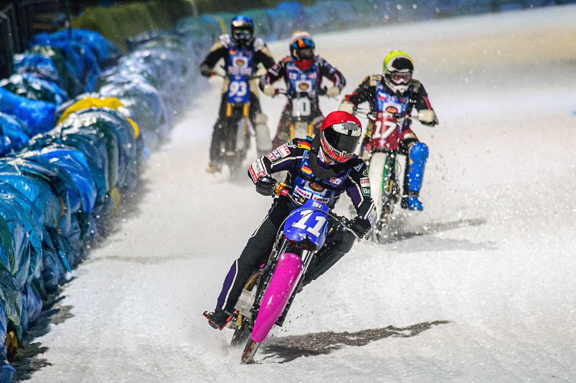 Benedikt Monn (Red) leads Andrej Divis (Yellow) Topi Mustonen (White) and Franz Mayerbüchler (Blue) during the German Individual Ice Speedway Championship at Horst-Dohm-Eisstadion, Berlin on Friday 3rd March 2023. (Photo: Ian Charles | MI News)