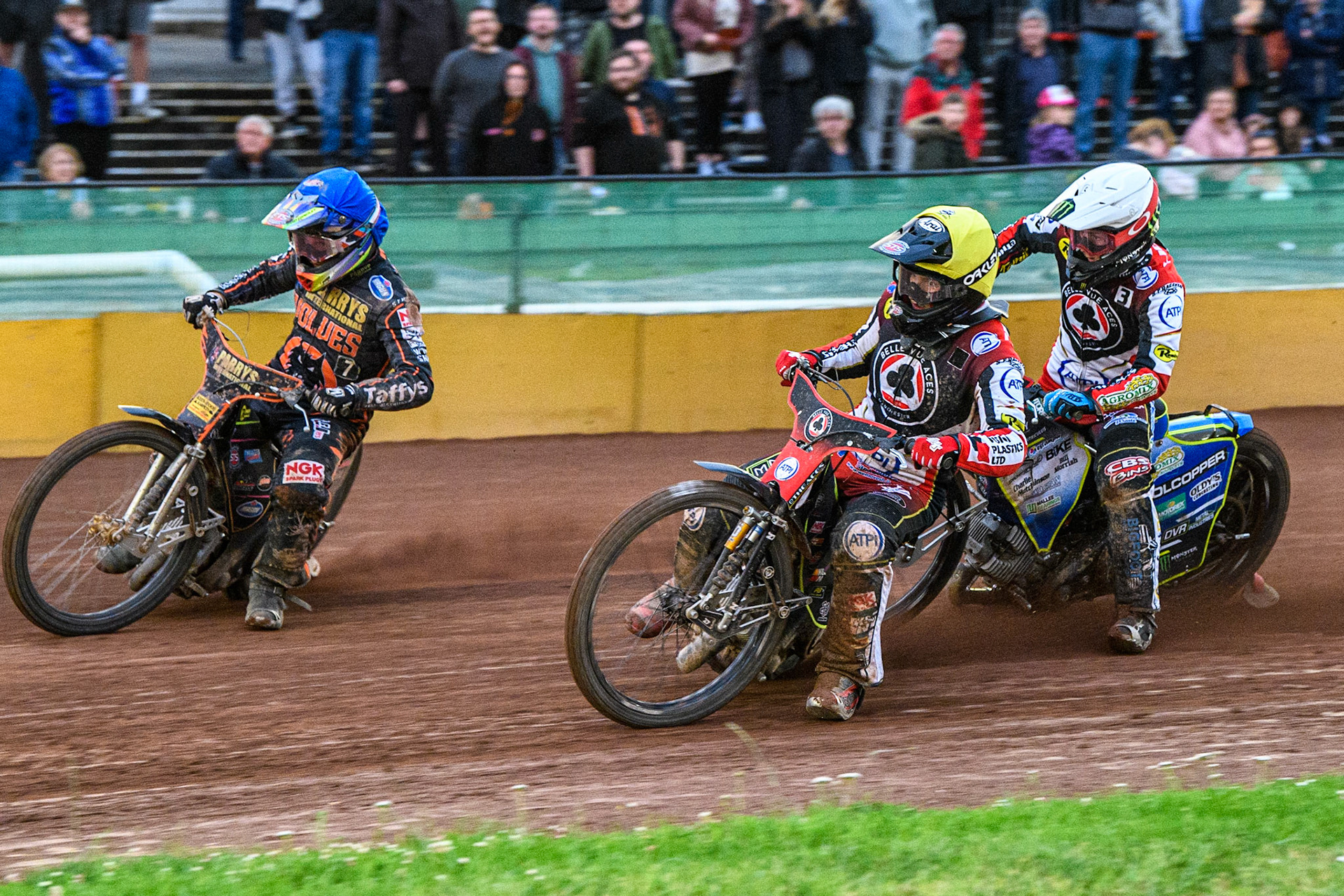 Tom Brennan (Yellow) inside Leon Flint (Blue) with Jaimon Lidsey (White) behind during the Sports Insure Premiership match between Wolverhampton Wolves and Belle Vue Aces at Monmore Green Stadium, Wolverhampton on Monday 10th July 2023. (Photo: Ian Charles | MI News)