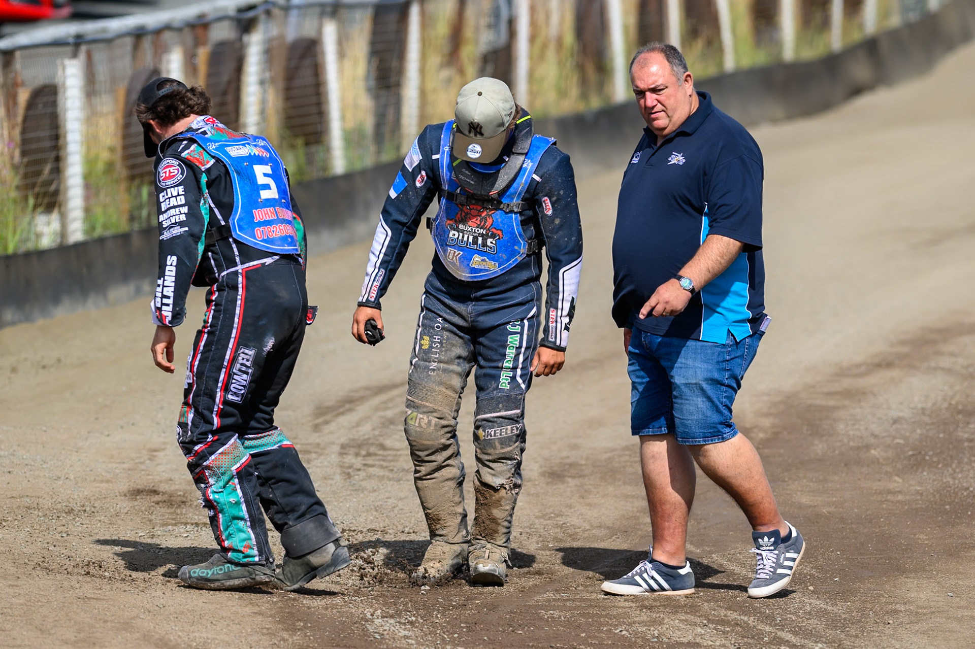 (L to R) Alfie Bowtell of Buxton Bulls, Nathan Ablitt, Guest Rider for Buxton Bulls  and Jason Pipe, Team Manager of Kings Lynn Young Stars discuss the condition of the track during the WSRA National Development League match between Buxton Bulls and King's Lynn Young Stars at Hi-Edge Speedway, Buxton on Sunday 9th August 2026. (Photo: Ian Charles | MI News)