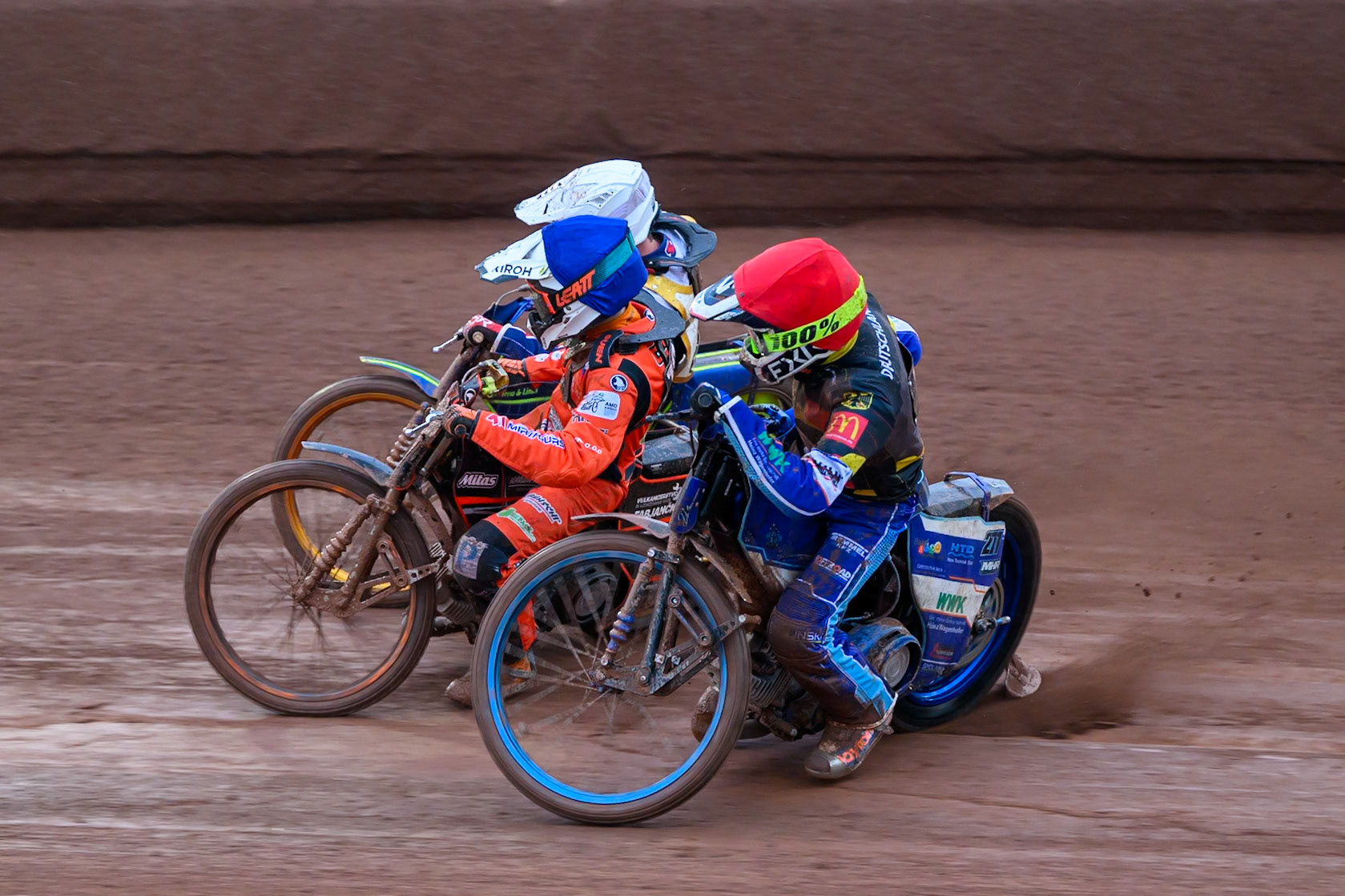 Mario Hausl of Germany in Red rides inside Sven Cerjak of Slovenia in Blue and Lasse Fredriksen of Norway in White during the Speedway GP Qualifying Round 3 at Allied Ashfield Stadium, Glasgow on Saturday 30th May 2026. (Photo: Ian Charles | MI News)