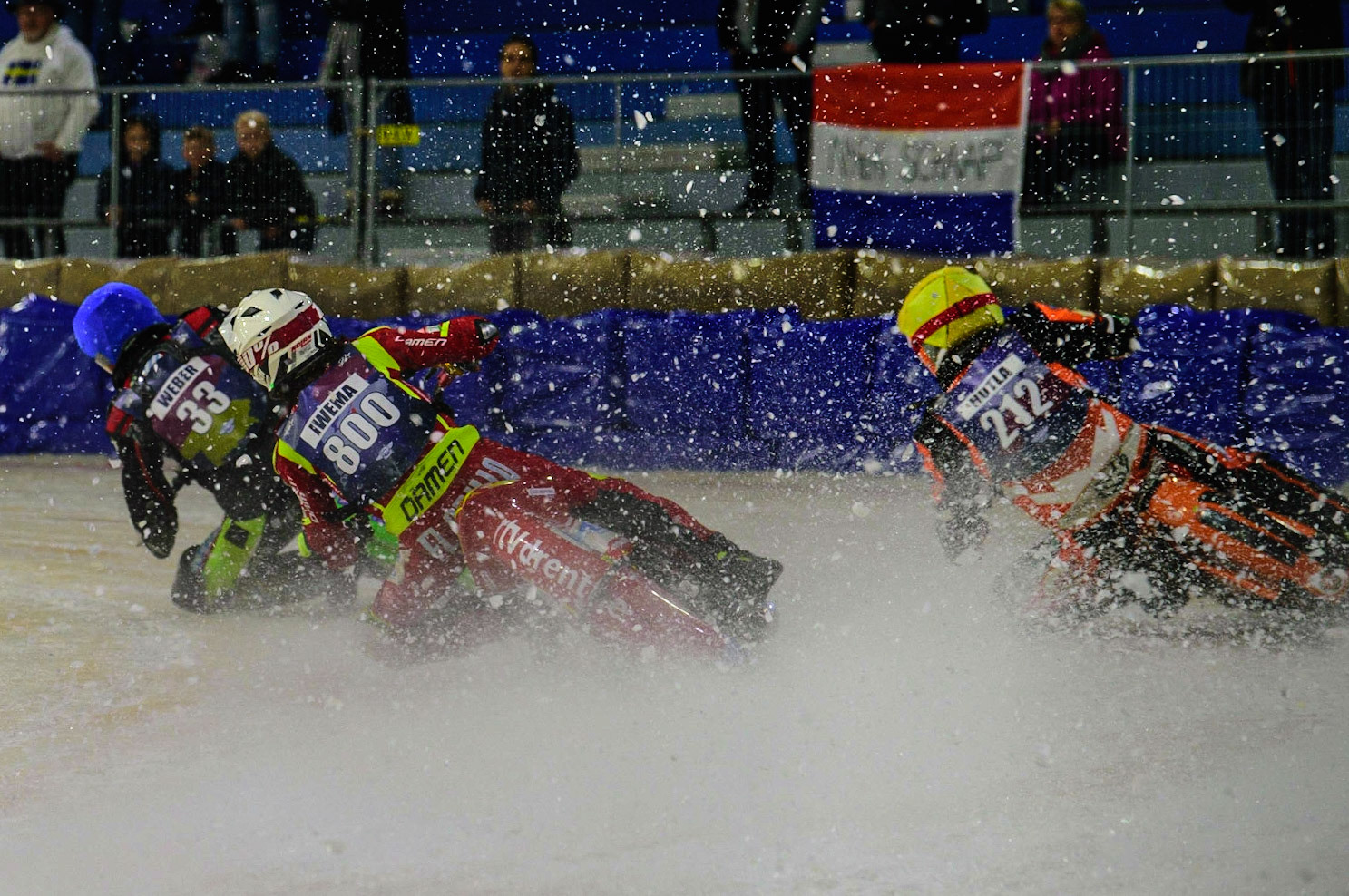 HEERENVEEN, NL. Jasper Iwema (800) and Lukas Hutla (212) chases Johann Weber (33)    during the FIM Ice Speedway Gladiators World Championship Final 4 at Ice Rink Thialf, Heerenveen on Sunday  3 April 2022. (Credit: Ian Charles | MI News)
