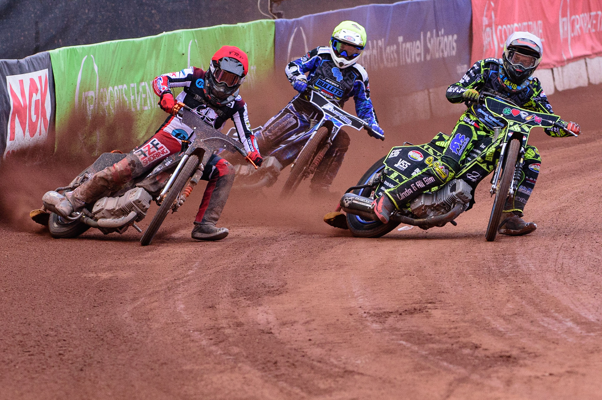 MANCHESTER, UK. JUN 24TH  Ace Pijper  (White) inside Jack Smith  (Red) with Greg Blair  (Yellow) behind during the National Development League match between Belle Vue Colts and Berwick Bullets at the National Speedway Stadium, Manchester on Friday 24th June 2022. (Credit: Ian Charles | MI News)