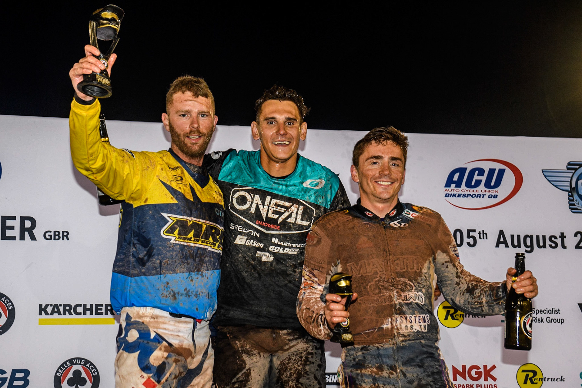 The Top 3 in the meeting after the Grand Final: (l - r) Ervin Krajčovič (34) Czech Rep.(2nd), Ondřej Svědík (22) Czech Rep. (1st), Sammy Halbert (69) USA (3rd) during the FIM World Flat Track Championship Round 1 at the National Speedway Stadium, Manchester on Saturday 5th August 2023. (Photo: Ian Charles | MI News)