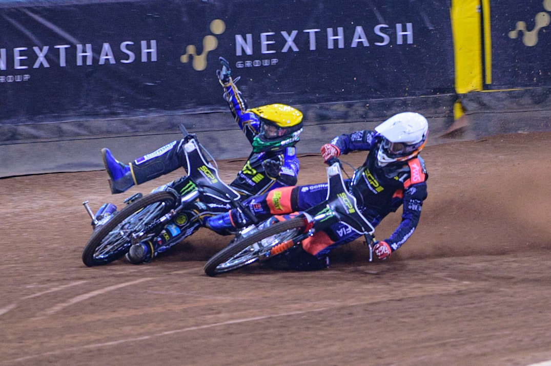 Andžejs Ļebedevs (29) (White) collides with Jason Doyle (69) (Yellow) on the opening turn during the FIM  Speedway Grand Prix of Great Britain at the Principality Stadium, Cardiff on Saturday 13th August 2022. (Credit: Ian Charles | MI News