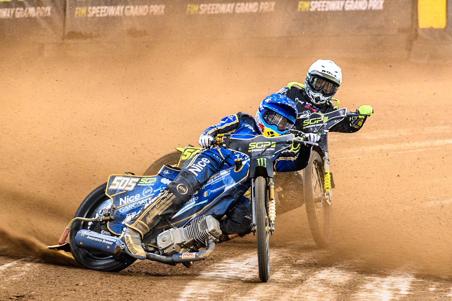 Robert Lambert (505) of Great Britain in Blue leading Martin Vaculik (54) of Slovakia in White  in Semi Final 1 during the FIM Speedway Grand Prix of Great Britain at The Principality Stadium, Cardiff on Saturday 17th August 2024. (Photo: Ian Charles | MI News)