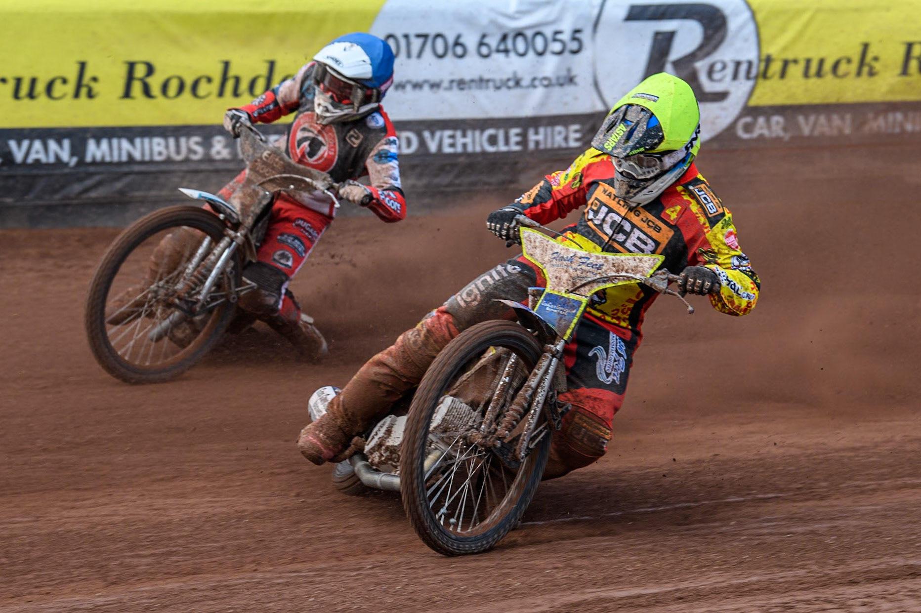 Leicester Lion Cubs' Arran Butcher (Yellow) leads  Belle Vue Colts' Chad Wirtzfeld (Blue) during the WSRA National Development League match between Belle Vue Colts and Leicester Lion Cubs at the National Speedway Stadium, Manchester on Friday 29th March 2024. (Photo: Ian Charles | MI News)