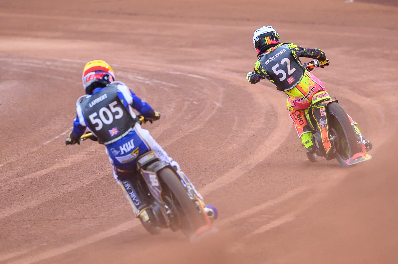 Robert Lambert (505) of Great Britain in Yellow chases Michael Jepsen Jensen (52) of Denmark in White during the ATPI  FIM Speedway GP of Manchester at the National Speedway Stadium, Manchester on Saturday 6th June 2026. (Photo: Ian Charles | MI News)