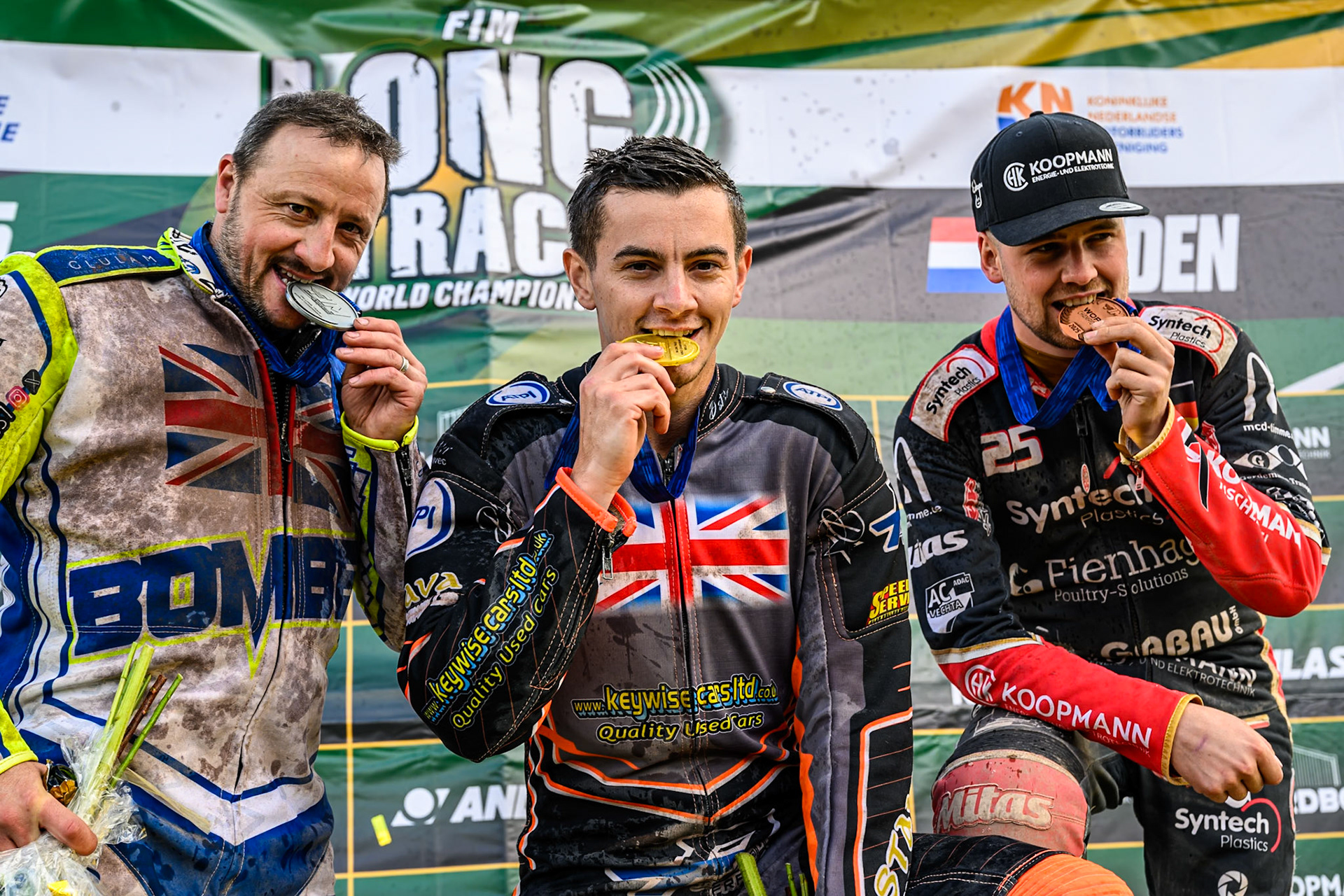 World Championship Top 3: (L to R) Chris Harris (37) of Great Britain (2nd), Zach Wajtknecht (109) of Great Britain (World Champion) Lukas Fienhage (125) of Germany (3rd) during the FIM Long Track World Championship Final 4, at the Speed Centre Roden, Netherlands on Sunday 21st September 2025. (Photo: Ian Charles | MI News)