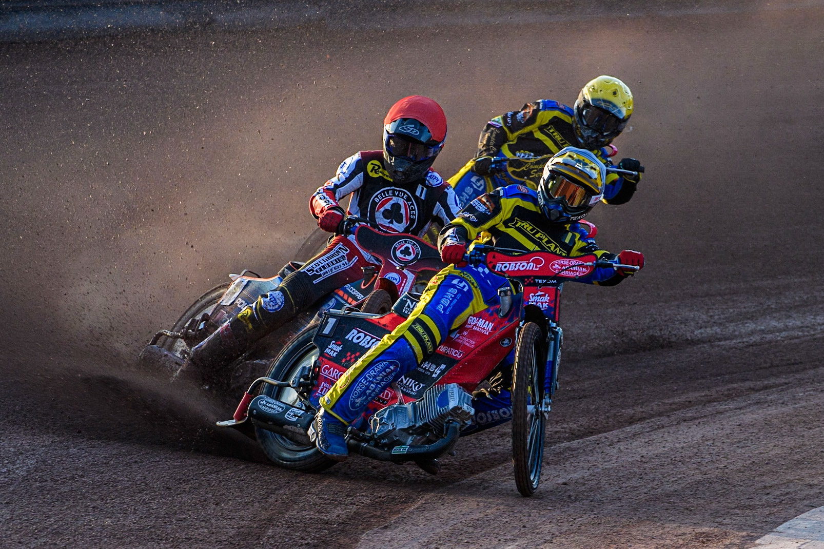Tobiasz Musielak (White) leads Brady Kurtz (Red) and Kyle Howarth (Yellow) during the Sports Insure Premiership match between Belle Vue Aces and Sheffield Tigers at the National Speedway Stadium, Manchester on Monday 7th August 2023. (Photo: Ian Charles | MI News)