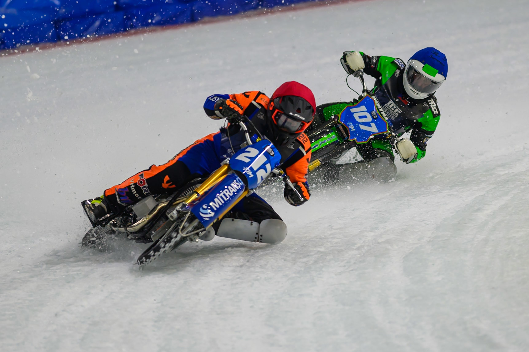 Lukas Hutla (212) of Czechia hits a rut in the ice in front of Andrej Divis (107) of Czechia in Blue during the FIM Ice Speedway Gladiators World Championship Final 3 at Ice Rink Thialf, Heerenveen on Saturday 11th April 2026. (Photo: Ian Charles | MI News)