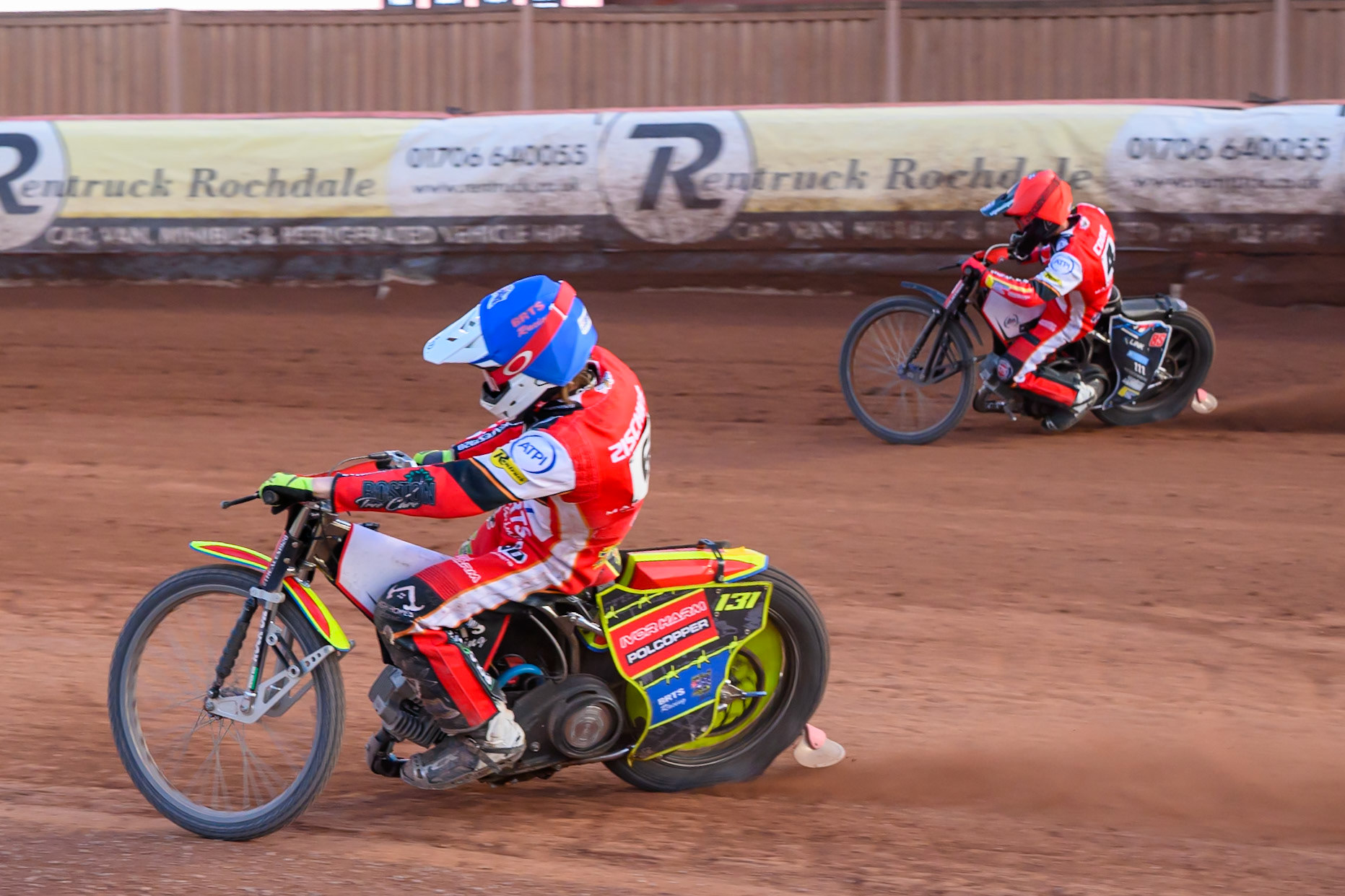 Belle Vue Aces' Tate Zischke in Blue on the inside  of team mate Jaimon Lidsey in Red during the Rowe Motor Oil Premiership match between Belle Vue Aces and Leicester Lions at the National Speedway Stadium, Manchester on Monday 14th July 2025. (Photo: Ian Charles | MI News)
