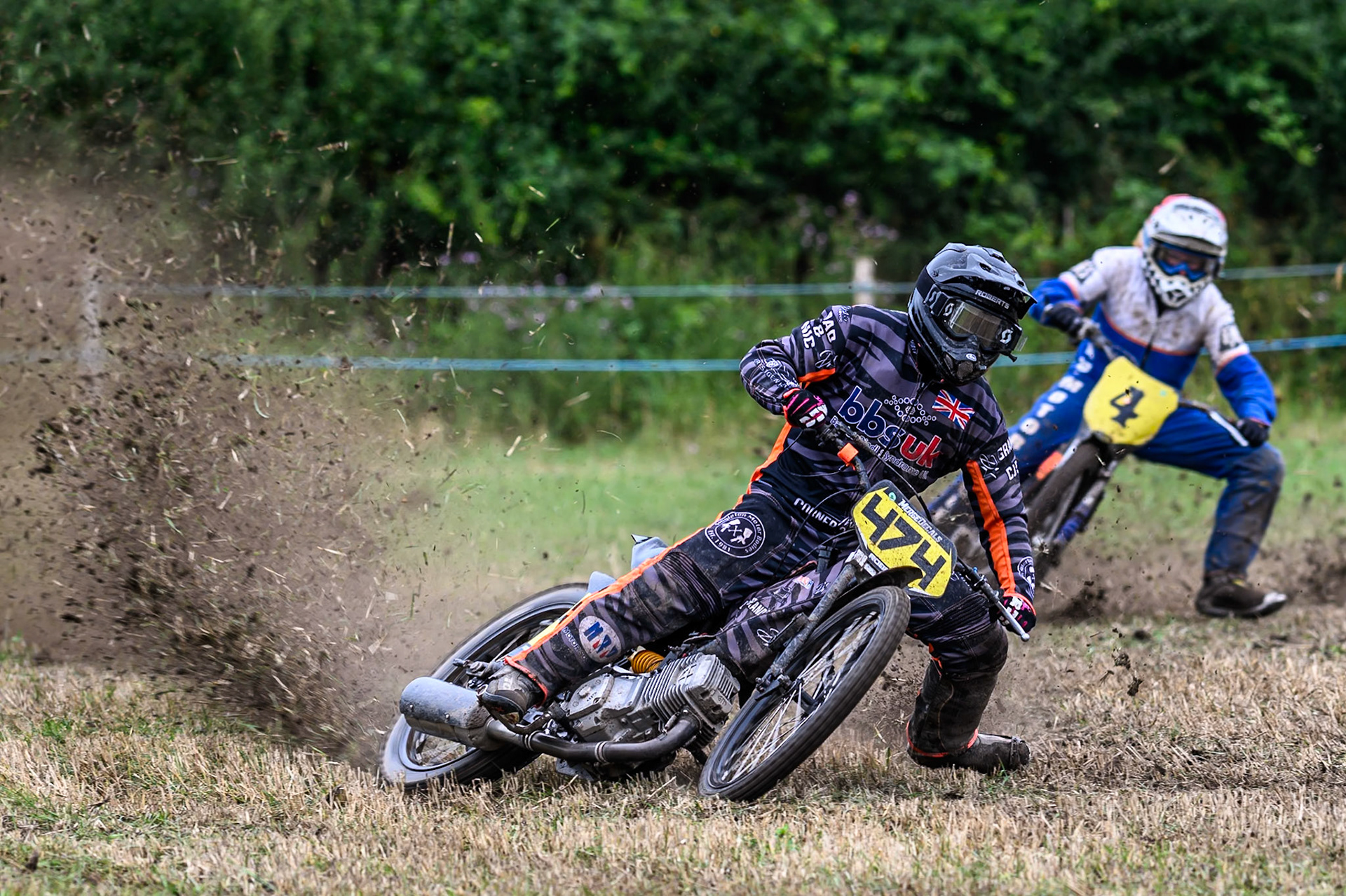 Jack Roberts (474) leading Simon Hammersley (4) in the 500cc Class during the ACU Northern Grass Track Riders Championship at Cheshire Grass Track Club, Frog Lane, Knutsford, Cheshire on Sunday 20th July 2025. (Photo: Ian Charles | MI News)