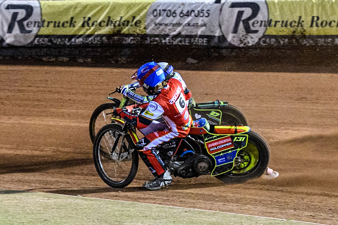 Belle Vue Aces' Tate Zischke rides inside Oxford Spires' Rohan Tungate in White during the Rowe Motor Oil Premiership match between Belle Vue Aces and Oxford Spires at the National Speedway Stadium, Manchester on Monday 14th April 2025. (Photo: Ian Charles | MI News)