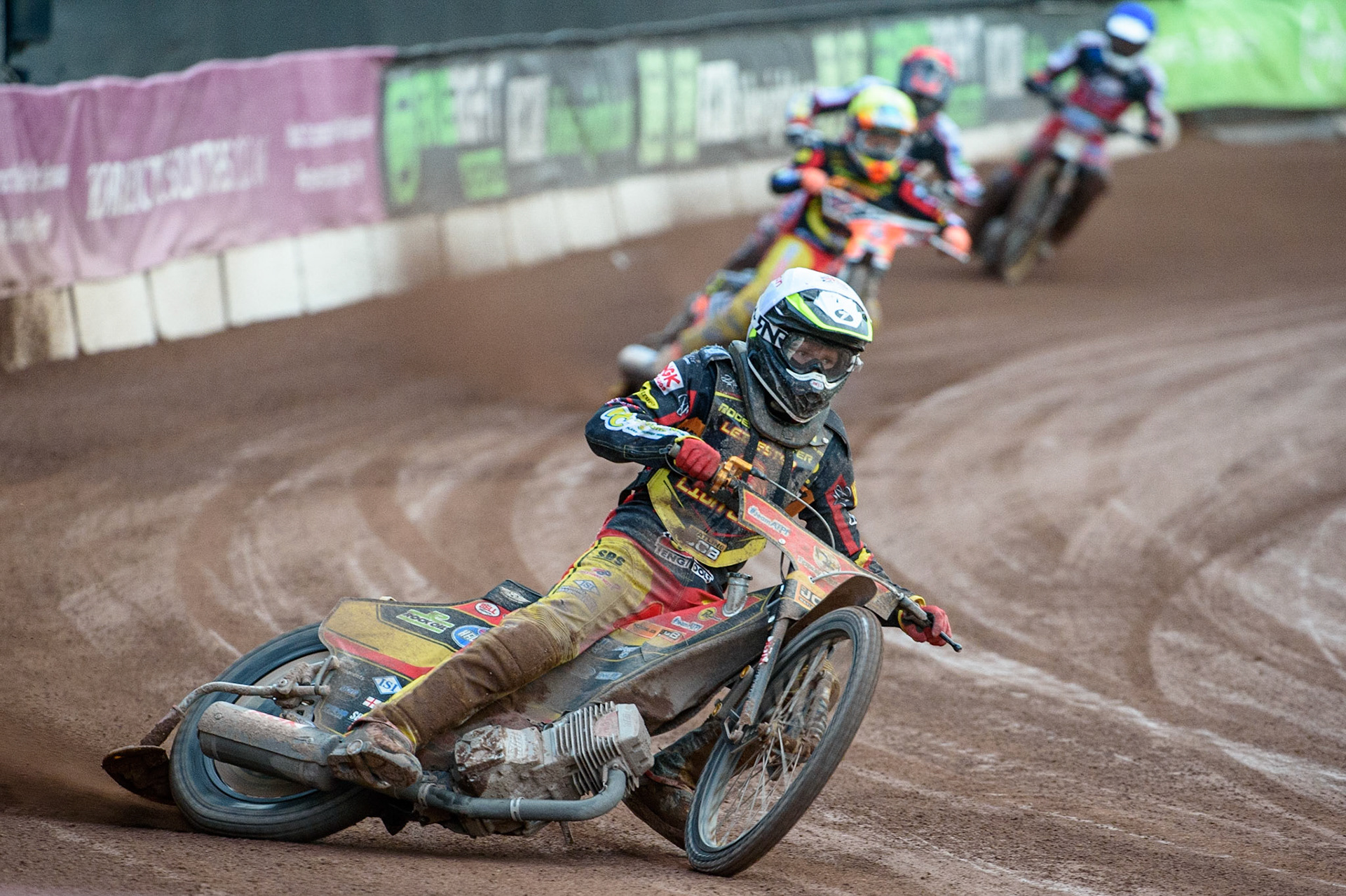 MANCHESTER, UK. JULY 29TH  Dan Thompson  (White) and Ben Trigger  (Yellow) lead Jack Parkinson-Blackburn  (Red) and Paul Bowen  (Blue) as they head for a maximum points heat win  during the National Development League match between Belle Vue Colts and Leicester Lion Cubs at the National Speedway Stadium, Manchester on Thursday 29th July 2021. (Credit: Ian Charles | MI News)