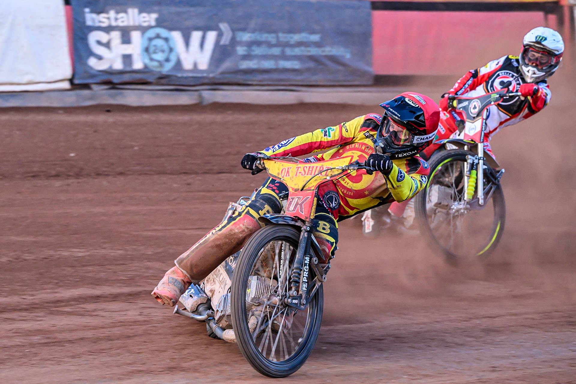 Birmingham Brummies' Tobias Musielak  in Red leading Belle Vue Aces' Jaimon Lidsey  in White during the Rowe Motor Oil Premiership match between Birmingham Brummies and Belle Vue Aces at Perry Barr Stadium, Birmingham on Monday 28th July 2025. (Photo: Ian Charles | MI News)