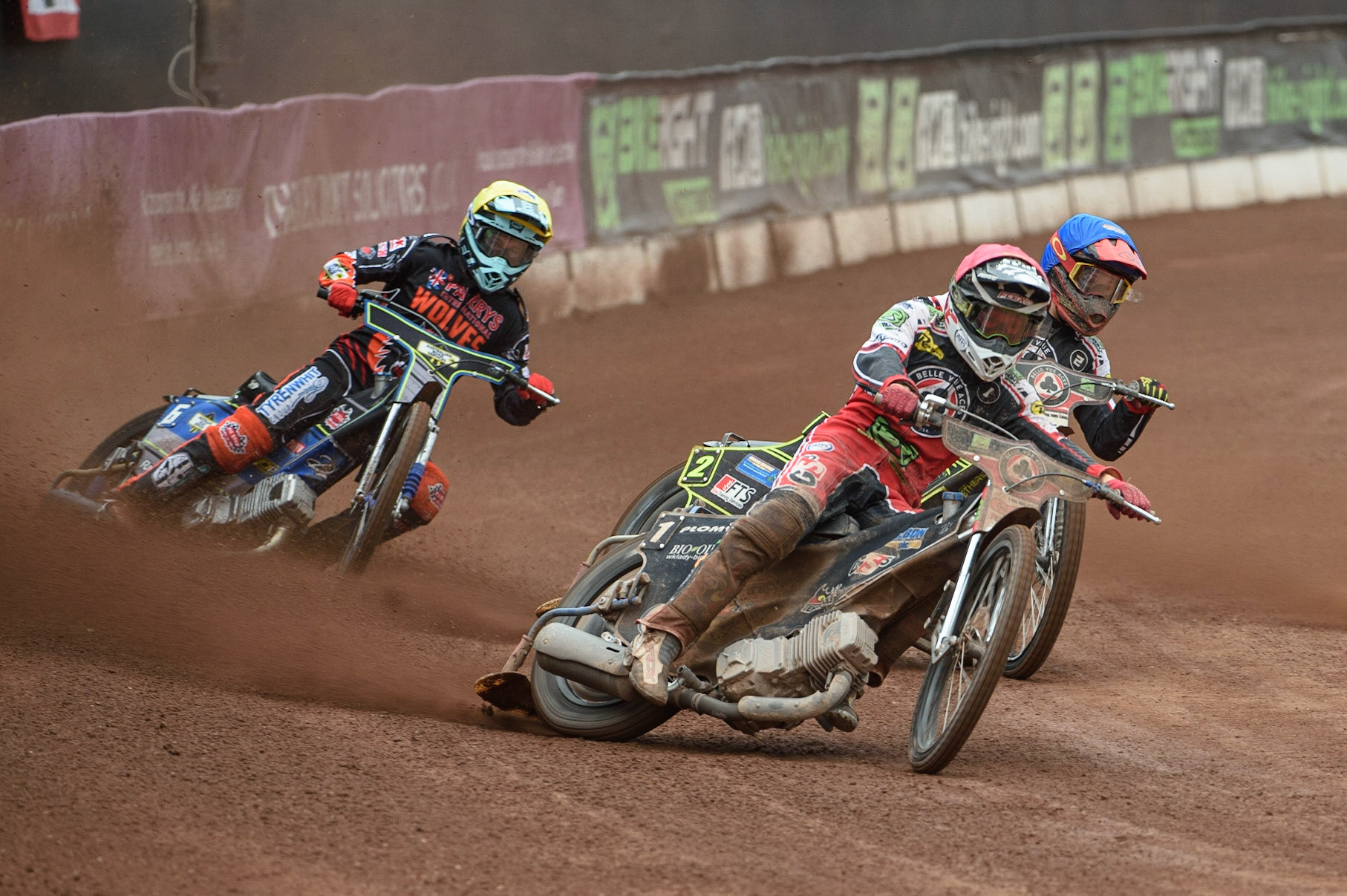 MANCHESTER, UK. AUGUST 30TH Dan Bewley  (Red) and Jye Etheridge  (Blue) lead Ryan Douglas (Yellow) during the SGB Premiership match between Belle Vue Aces and Wolverhampton Wolves at the National Speedway Stadium, Manchester on Monday 30th August 2021. (Credit: Ian Charles | MI News)