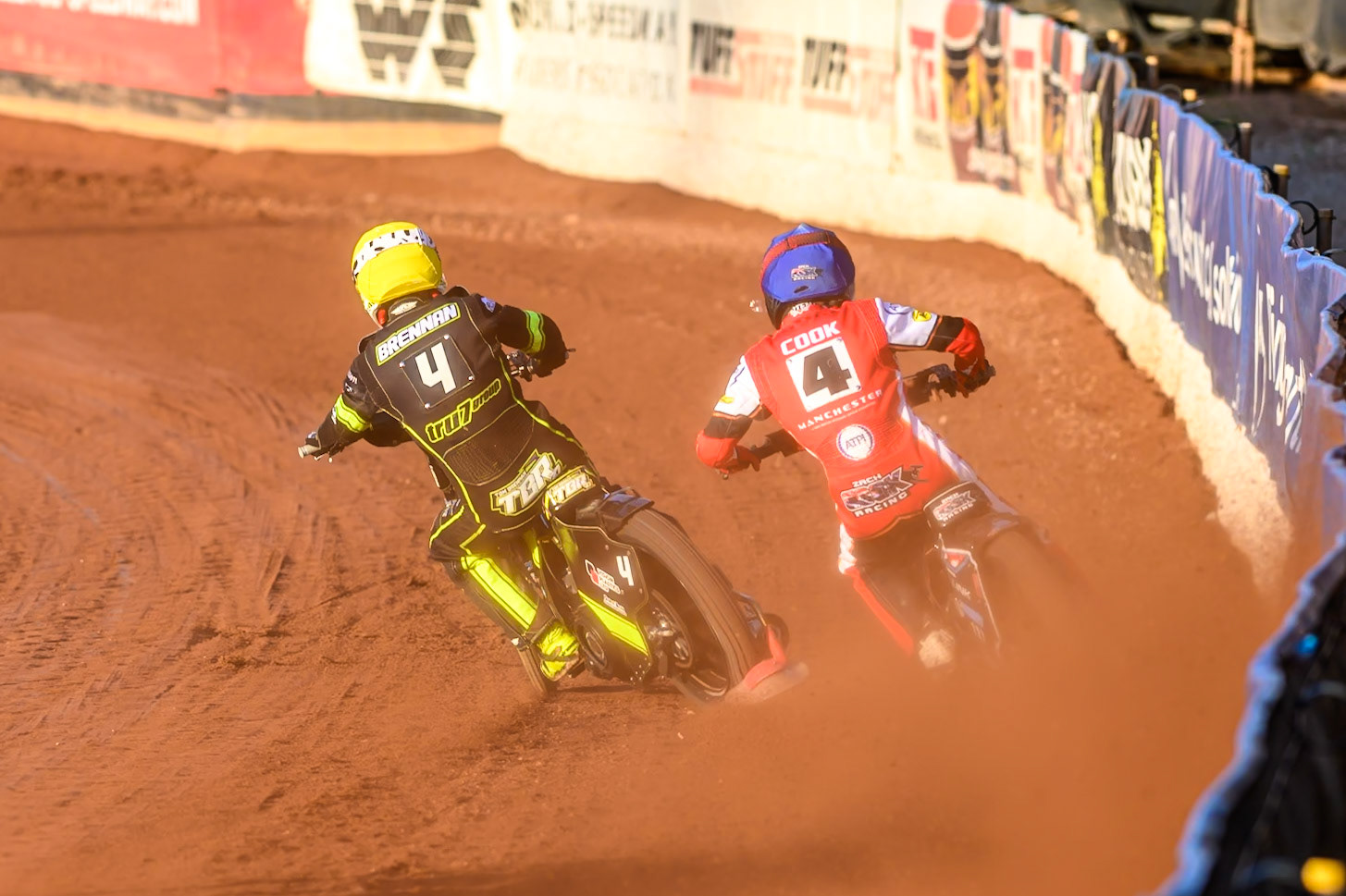 Zach Cook of Belle Vue Aces  in Blue rides outside Tom Brennan of Ipswich Witches  in Yellow during the Rowe Motor Oil Premiership match between Belle Vue Aces and Ipswich Witches at the National Speedway Stadium, Manchester on Monday 4th August 2025. (Photo: Ian Charles | MI News)