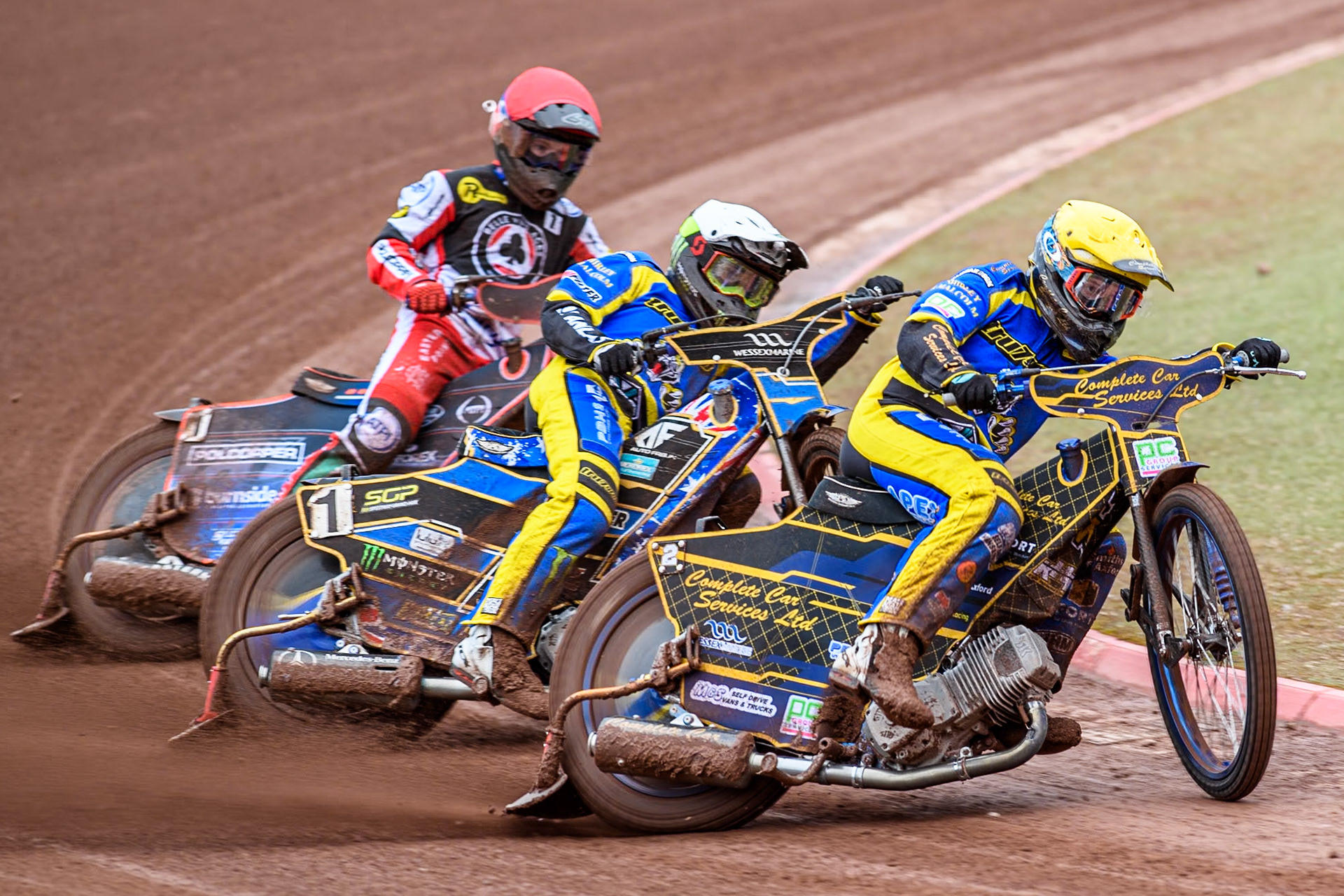Sheffield Tigers' Kyle Howarth leads  team mate Jack Holder and Belle Vue ATPI Aces Brady Kurtz (Red) during the Rowe Motor Oil Premiership KO Cup Quarter Final 1st Leg between Belle Vue Aces and Sheffield Tigers at the National Speedway Stadium, Manchester on Monday 1st April 2024. (Photo: Ian Charles | MI News)