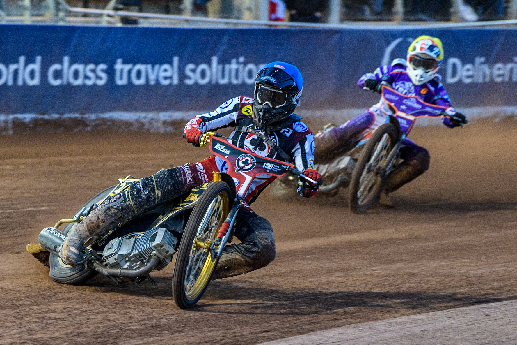 Norick Blodorn  (Blue) leads Ben Cook  (Yellow) during the SGB Premiership match between Belle Vue Aces and Peterborough at the National Speedway Stadium, Manchester on Monday 24th April 2023. (Photo: Ian Charles | MI News)