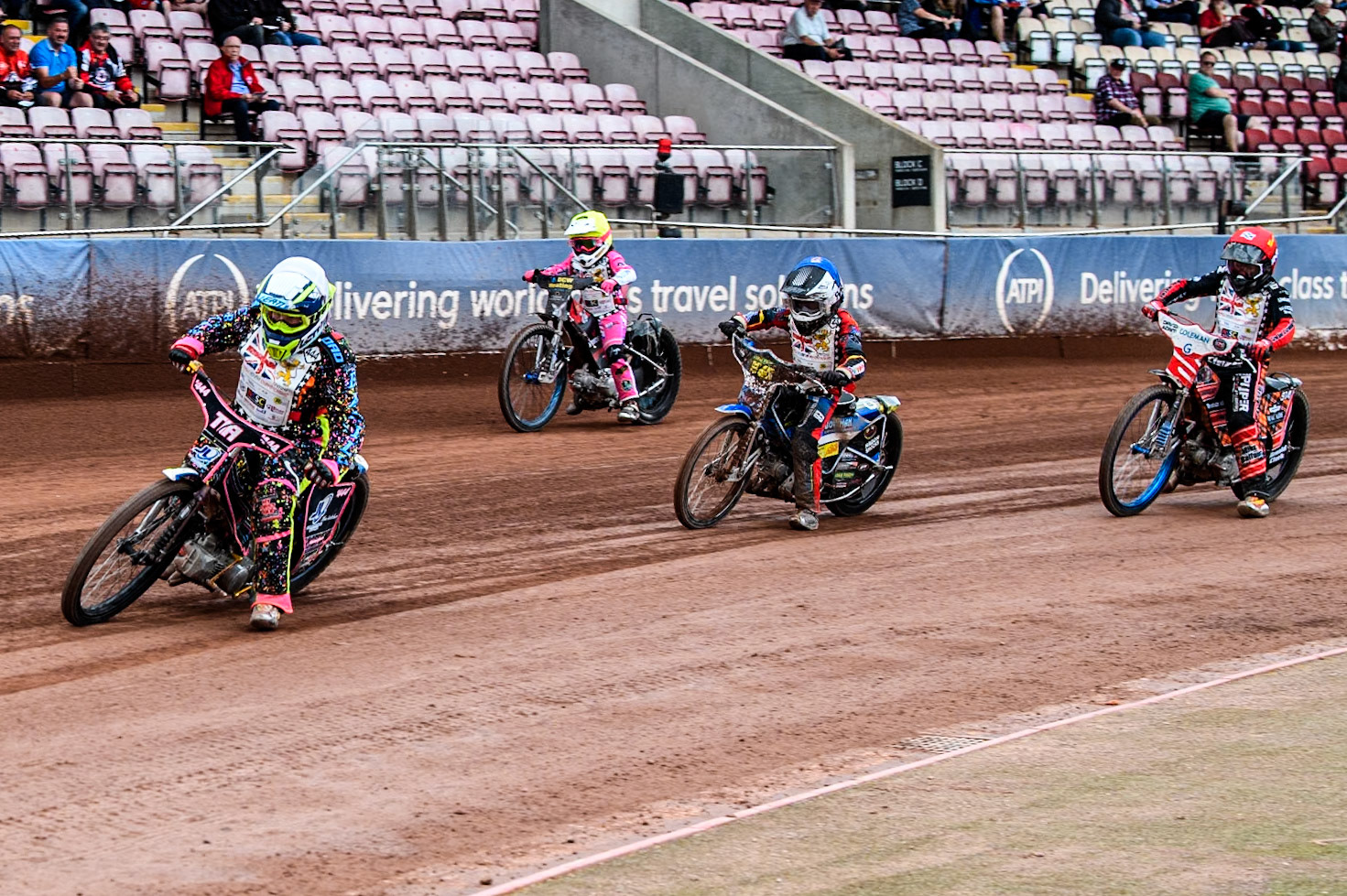 Tia May Brant (125cc) in White leading Charlie Fletcher (125cc)  in Blue Jessica Cox (125cc)  in Yellow and Rhys Harrow (125cc)  in Red during the British Youth 500cc Championships at the National Speedway Stadium, Manchester on Friday 2nd August 2024. (Photo: Ian Charles | MI News)
