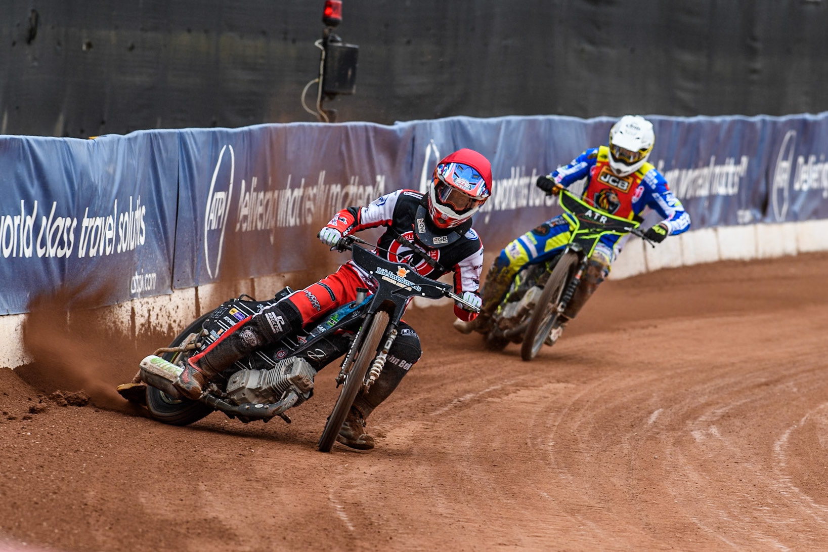 Belle Vue Colts' Freddy Hodder in Red leading Leicester Lion Cubs' Guest Rider Darryl Ritchings in White during the WSRA National Development League match between Belle Vue Colts and Leicester Lion Cubs at the National Speedway Stadium, Manchester on Friday 18th April 2025. (Photo: Ian Charles | MI News)