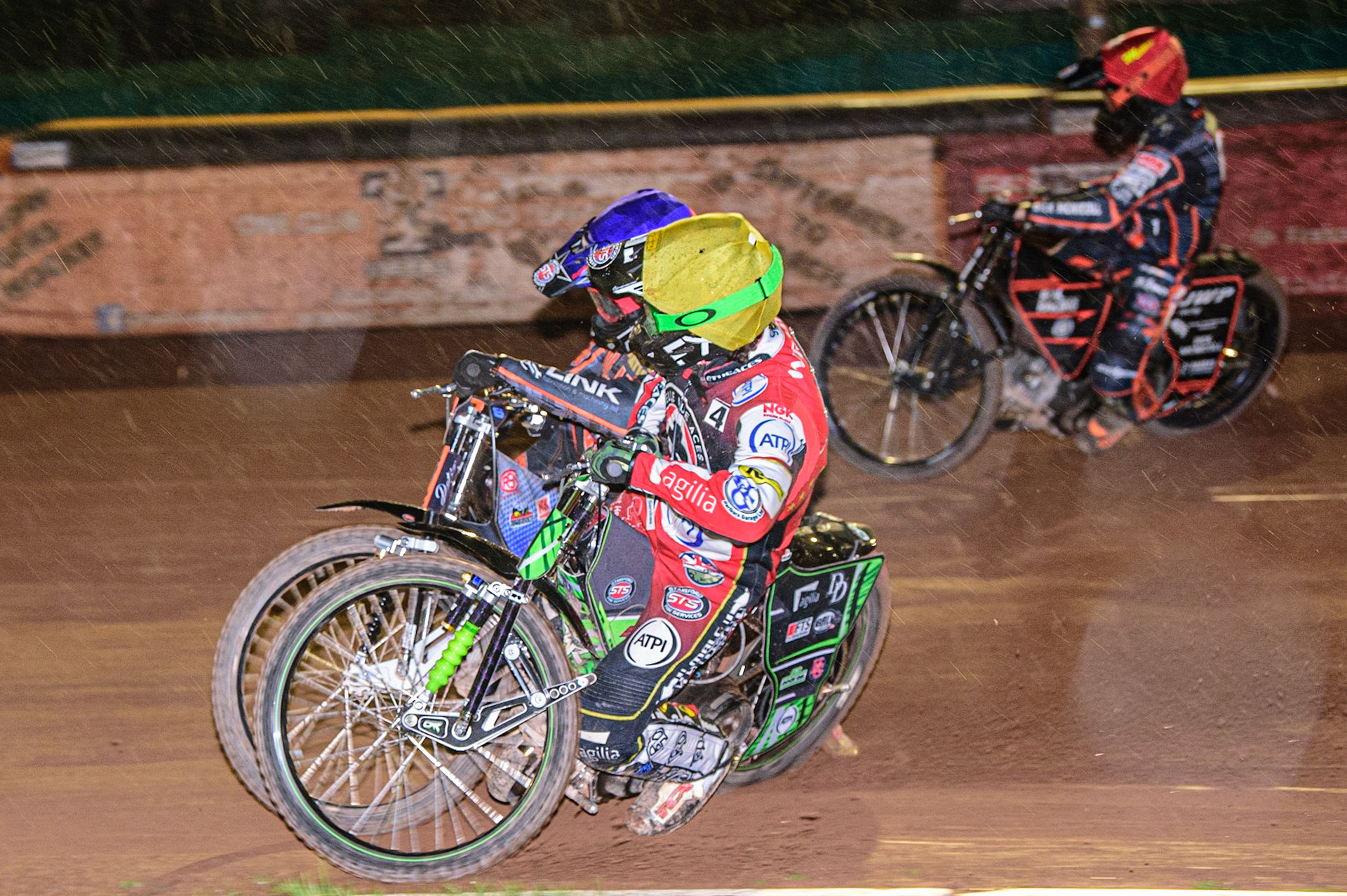 Charles Wright  (Yellow) inside Steve Worrall  (Blue) and Sam Masters  (Red) during the SGB Premiership Knock Out Cup Quarter Final 1st Leg between Wolverhampton Wolves and Belle Vue Aces at Monmore Green Stadium, Wolverhampton on Monday 10th April 2023. (Photo: Ian Charles | MI News)