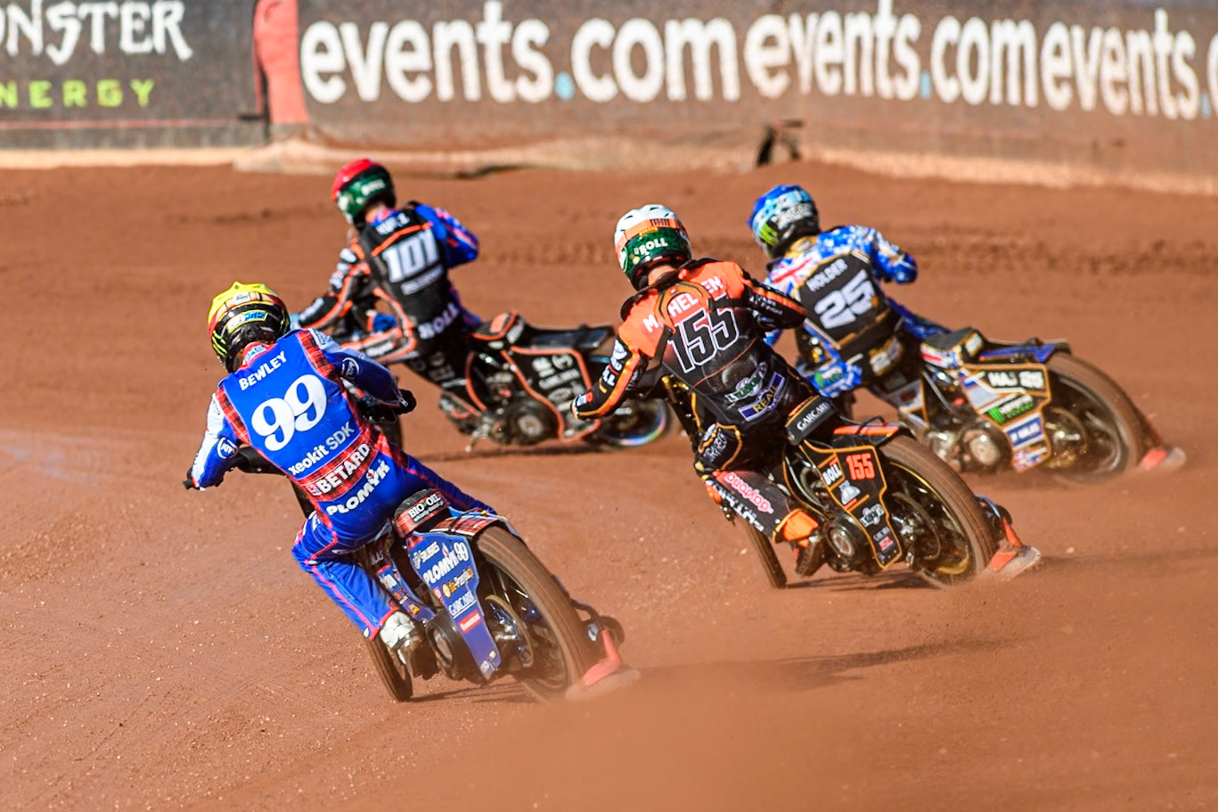 Dan Bewley (99) of Great Britain in Yellow chases Mikkel Michelsen (155) of Denmark in White, Jack Holder (25) of Australia in Blue and Brady Kurtz (101) of Australia in Red during the ATPI FIM Speedway Grand Prix Round 5 at the National Speedway Stadium, Manchester, on Saturday 14th June 2025. (Photo: Ian Charles | MI News)