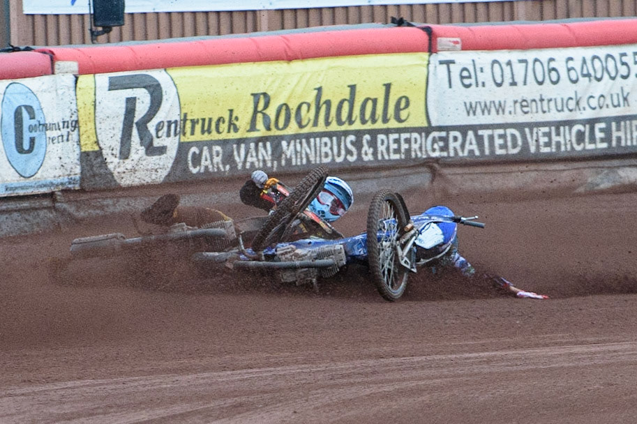 MANCHESTER, UK. JULY 29TH   Harry McGurk (Blue) picks up some drive and falls during the National Development League match between Belle Vue Colts and Leicester Lion Cubs at the National Speedway Stadium, Manchester on Thursday 29th July 2021. (Credit: Ian Charles | MI News)