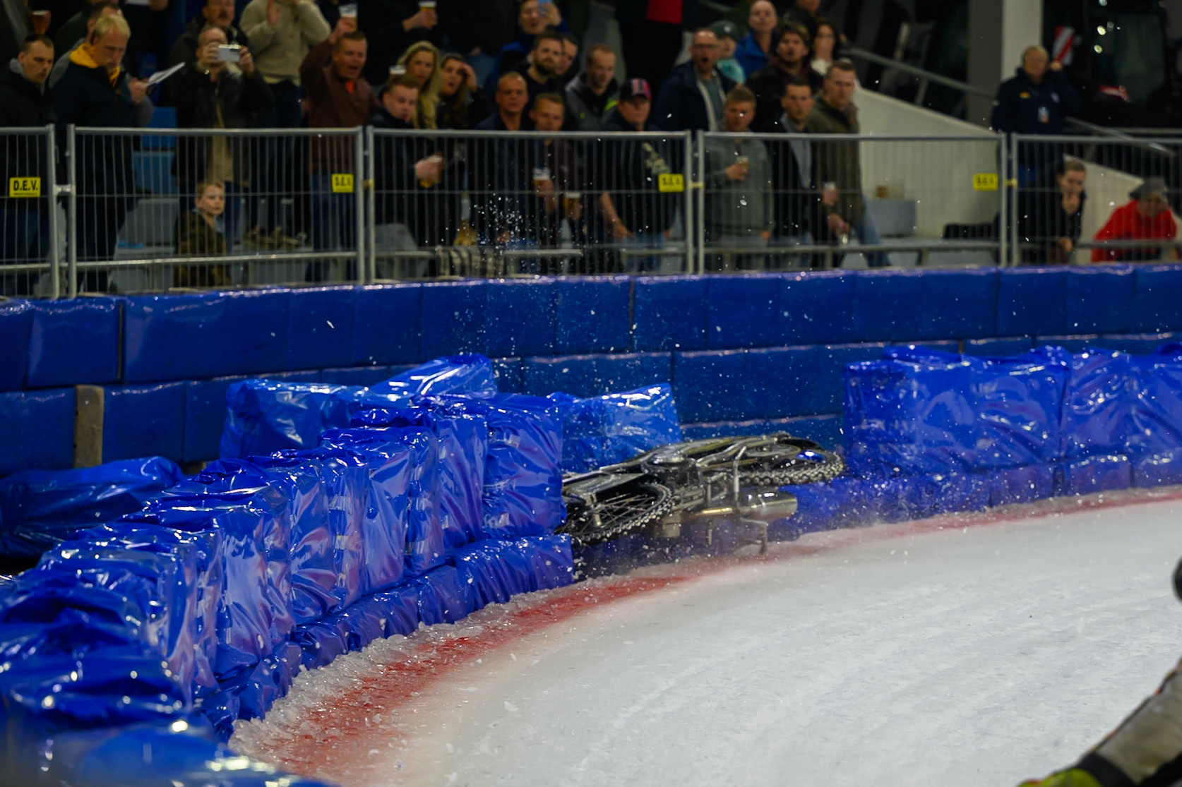 Heikki Huusko (67) of Finland  collides with Wild Card Harald Simon (16) of Austria in Yellow in the first turn during the FIM Ice Speedway Gladiators World Championship Final 3 at Ice Rink Thialf, Heerenveen on Saturday 11th April 2026. (Photo: Ian Charles | MI News)