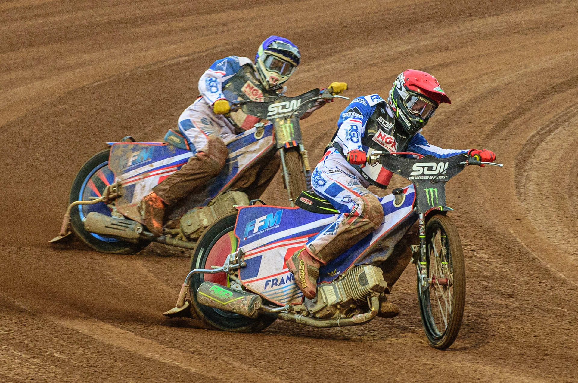 MANCHESTER, UK. OCT 17TH David Bellego of France (Red) leads team mate Dmitri Berge (Blue) during the Monster Energy FIM Speedway of Nations at the National Speedway Stadium, Manchester on Sunday  17th October 2021. (Credit: Ian Charles | MI News)