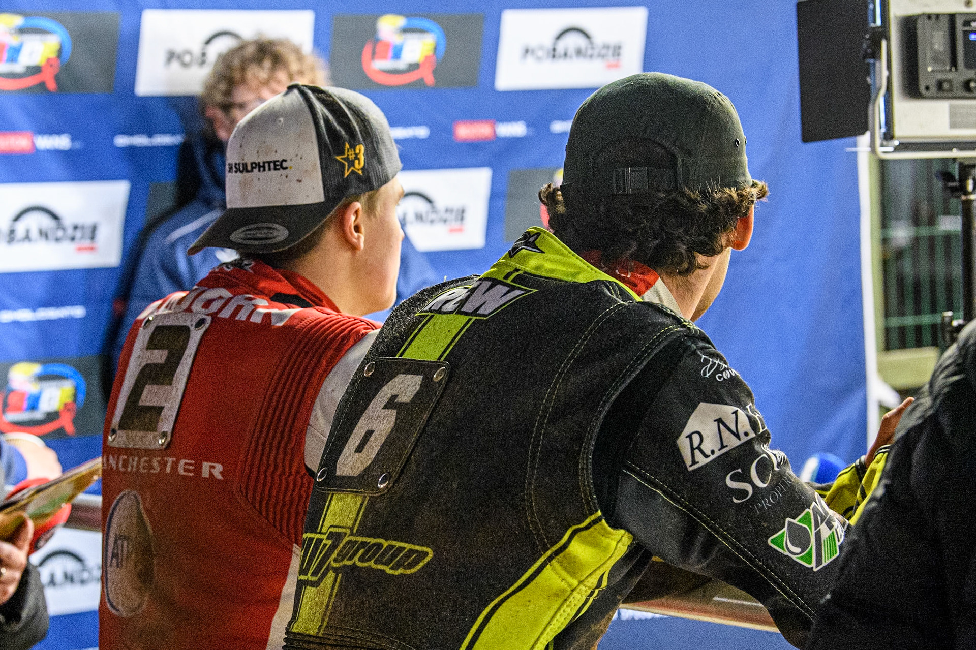 Belle Vue Aces' Norick Blödorn (Left) and Ipswich Witches' Keynan Rew watch the TV Replay on the BSN Monitor during the Rowe Motor Oil Premiership match between Belle Vue Aces and Ipswich Witches at the National Speedway Stadium, Manchester on Monday 22nd April 2024. (Photo: Ian Charles | MI News)