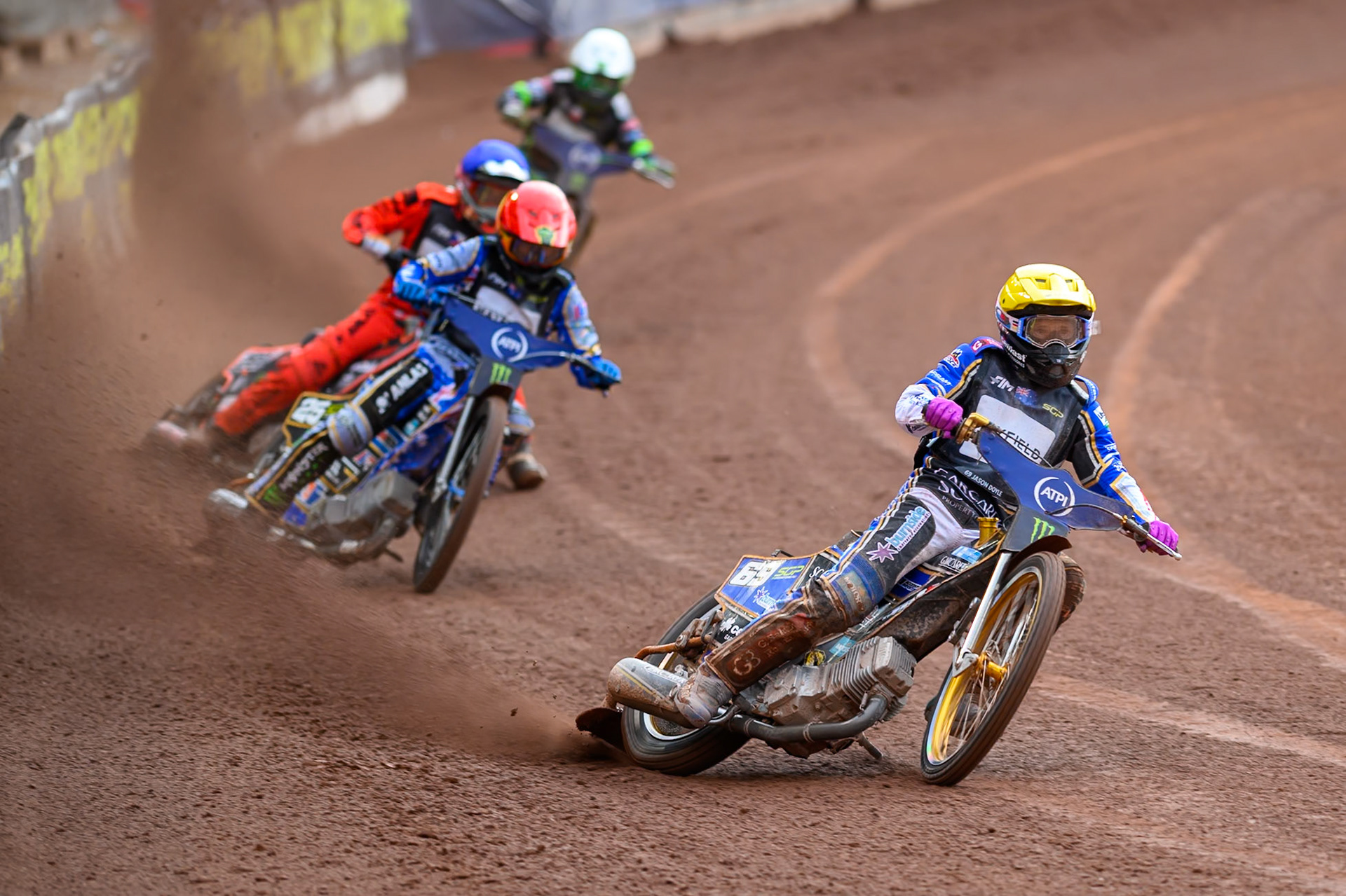 Jason Doyle (69) of Australia in Yellow leading Jack Holder (25) of Australia in Red Jan Kvech (201) of Czech Republic in Blue and Patryk Dudek (692) of Poland in White during the ATPI  FIM Speedway GP of Manchester at the National Speedway Stadium, Manchester on Saturday 6th June 2026. (Photo: Ian Charles | MI News)