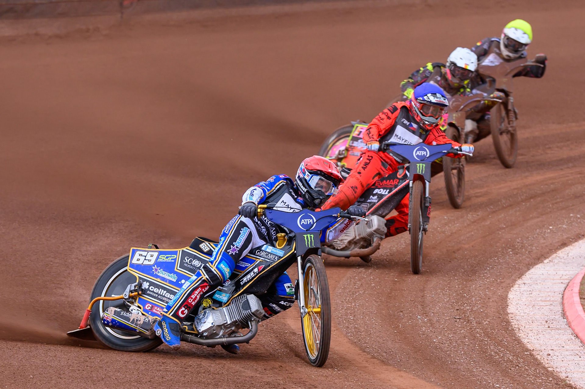 Jason Doyle (69) of Australia in Red leading Jan Kvech (201) of Czech Republic in Blue, Michael Jepsen Jensen (52) of Denmark in White and Kai Huckenbeck (744) of Germany  in Yellow during the ATPI  FIM Speedway GP of Manchester at the National Speedway Stadium, Manchester on Friday 5th June 2026. (Photo: Ian Charles | MI News)