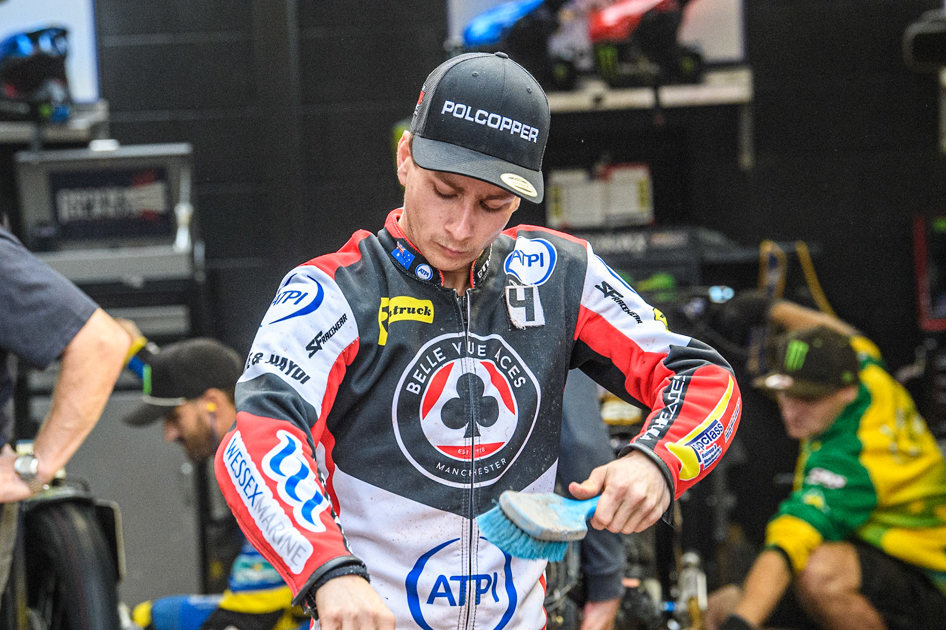 Belle Vue Aces' Ben Cook  brushes off the shale from his kevlars during the Rowe Motor Oil Premiership match between Sheffield Tigers and Belle Vue Aces at Owlerton Stadium, Sheffield on Monday 26th August 2024. (Photo: Ian Charles | MI News)