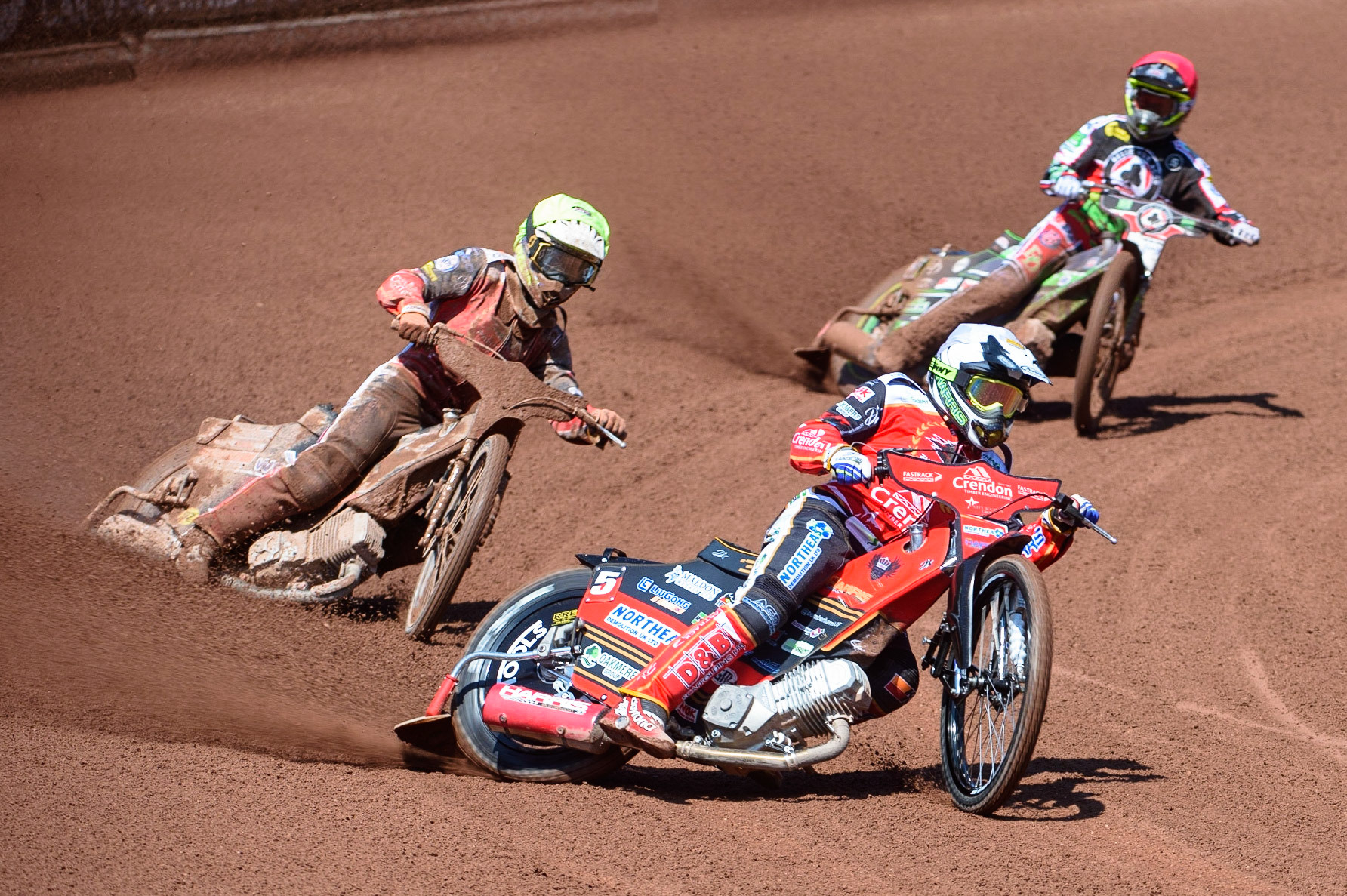 MANCHESTER, UK. MAY 31ST  Peterborough Crendon Panthers Chris Harris  (White) and Jordan Palin  (Yellow) lead Charles Wright (Red) during the SGB Premiership match between Belle Vue Aces and Peterborough at the National Speedway Stadium, Manchester on Monday 31st May 2021. (Credit: Ian Charles | MI News)