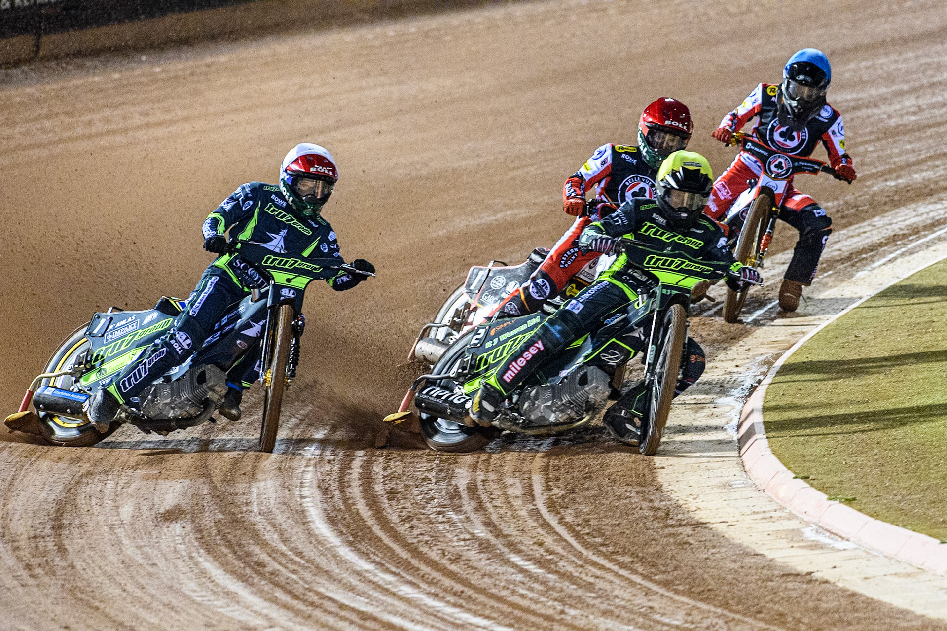 Danny King of Ipswich Witches in Yellow and Jason Doyle of Ipswich Witches in White leading Brady Kurtz of Belle Vue Aces in Red and Norick Blödorn of Belle Vue Aces in Blue during the Premiership Cup Quarter Final 1st Leg match between Belle Vue Aces and Ipswich Witches at the National Speedway Stadium, Manchester on Monday 24th March 2025. (Photo: Ian Charles | MI News)