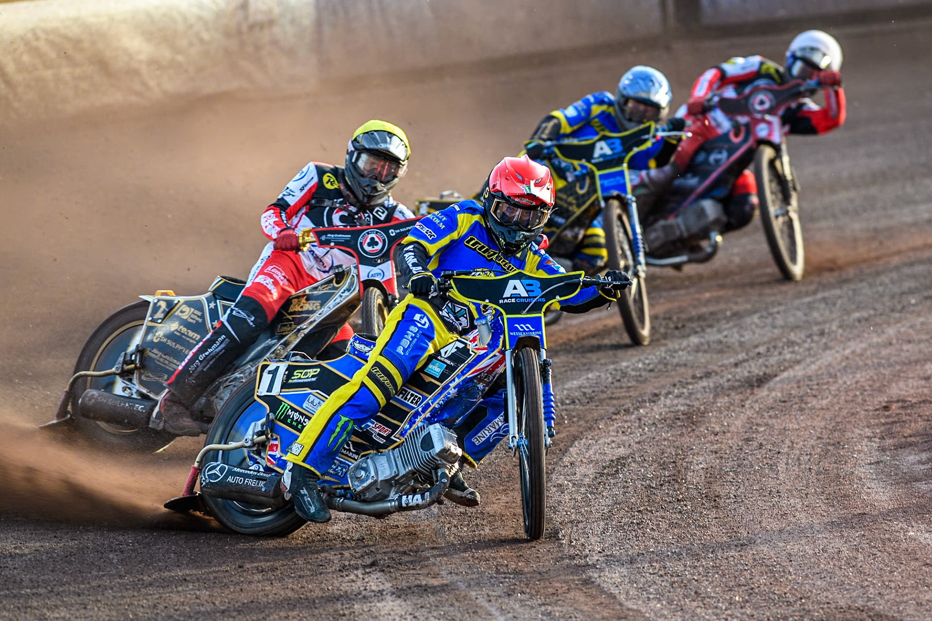 Sheffield Tigers' Jack Holder in Red leading Belle Vue Aces' Norick Blodorn  in Yellow with Sheffield Tigers' Kyle Howarth  in Blue and Belle Vue Aces' Brady Kurtz  in White behind during the Premiership KO Cup Quarter Final, 2nd Leg match between Sheffield Tigers and Belle Vue Aces at Owlerton Stadium, Sheffield on Thursday 9th May 2024. (Photo: Ian Charles | MI News)