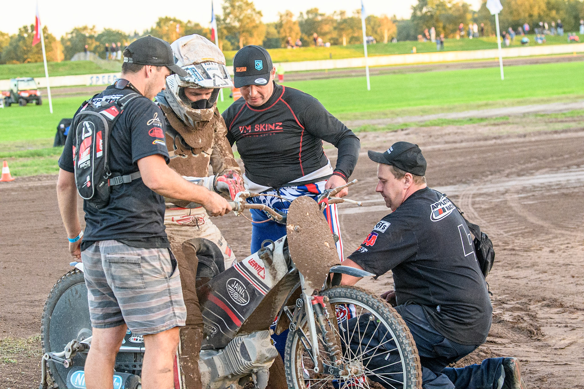 British Team Manager Paul Hurry (2nd Right) congratulates Andrew Appleton after his  B Final appearance during the FIM Long Track Of Nations event at the Speed Centre Roden on Sunday 24th September 2023. (Photo: Ian Charles | MI News)