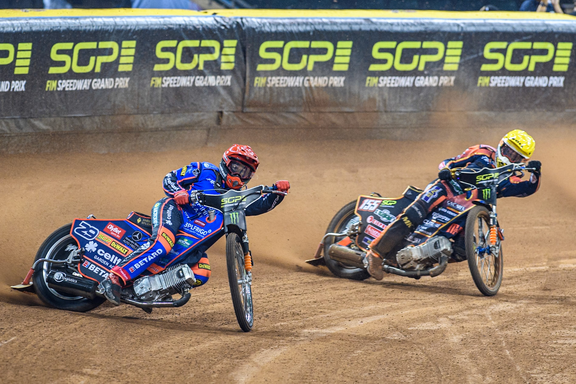 Andzejs Lebedevs (29) of Latvia in Red leading Mikkel Michelsen (155) of Denmark in Yellow during the FIM Speedway Grand Prix of Great Britain at The Principality Stadium, Cardiff on Saturday 17th August 2024. (Photo: Ian Charles | MI News)