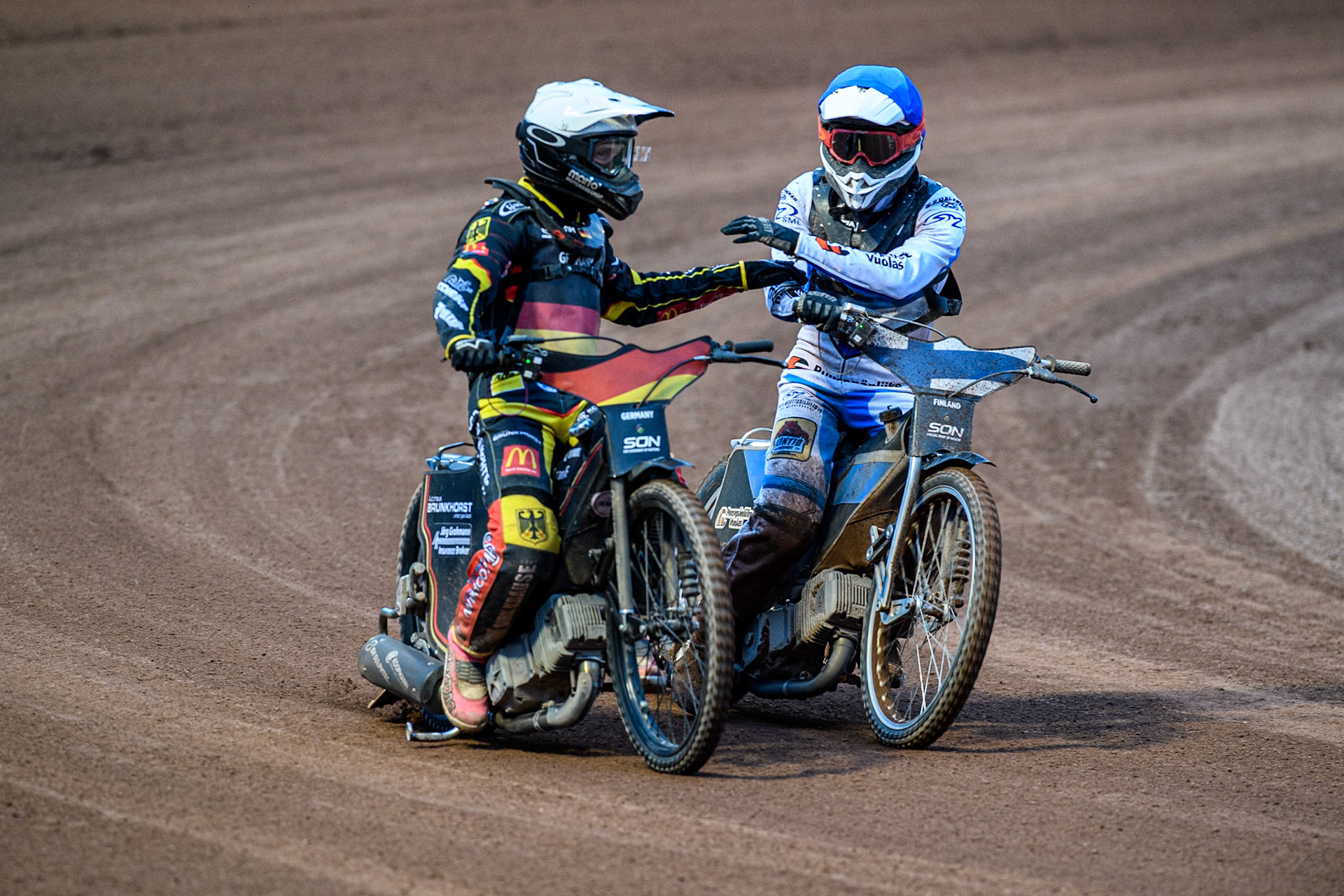 Kai Huckenbeck of Germany in White is  congratulated by Antti Vuolas of Finland after the third place run off was won by Germany during the Monster Energy FIM Speedway of Nations Semi-Final 1 at the National Speedway Stadium, Manchester on Tuesday 9th July 2024. (Photo: Ian Charles | MI News)