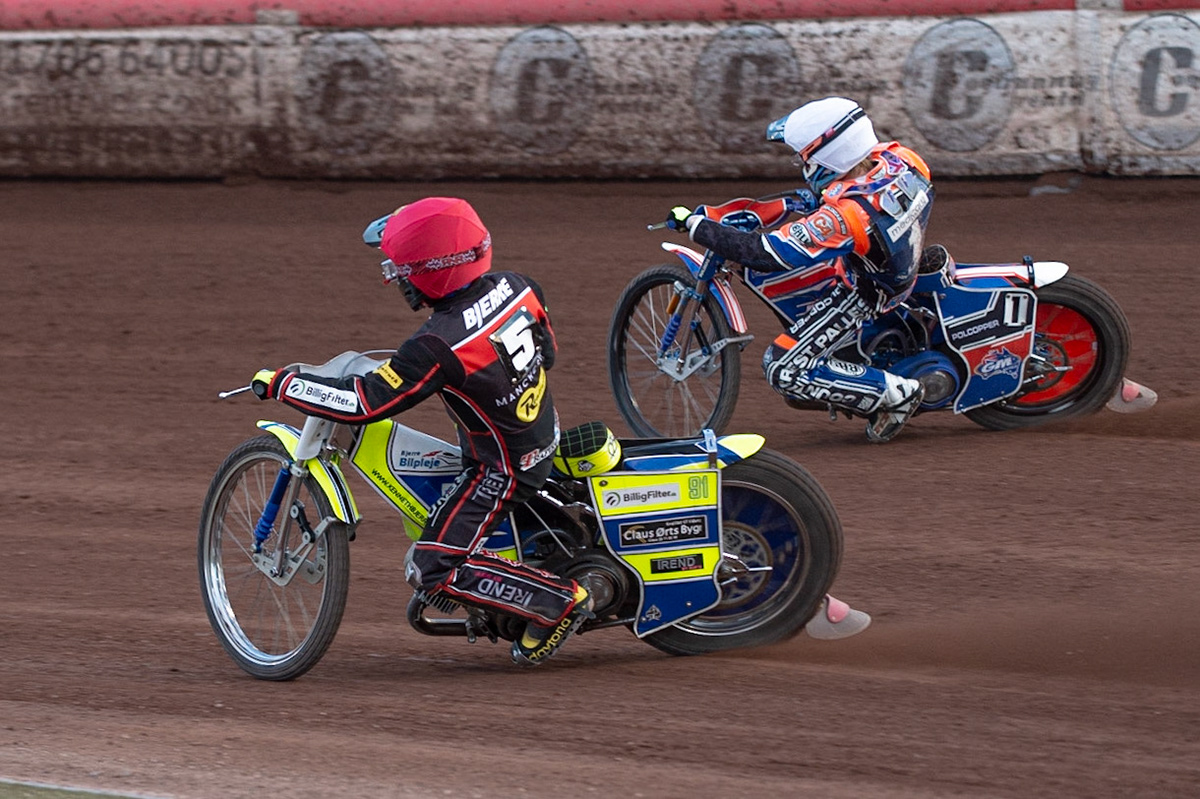 Photo by Ian Charles

Kenneth Bjerre  (Red) inside Brady Kurtz  (White)

Belle Vue Aces v Poole Pirates, British Speedway Premiership, Belle Vue National Speedway Stadium, Manchester, Monday 1  July  2019