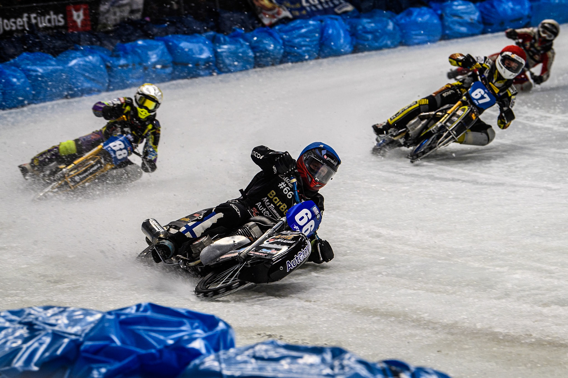 Aki Ala-Riihimäki (66) of Finland in Blue leading Max Niedermaier  (88) of Germany in Yellow, Heikki Huusko (67) of Finland in Red and Martin Posch (299) of Austria in Blue during the Ice Speedway Gladiators World Championship Final 2 at Max-Aicher-Arena, Inzell on Sunday 16th March 2025. (Photo: Ian Charles | MI News)