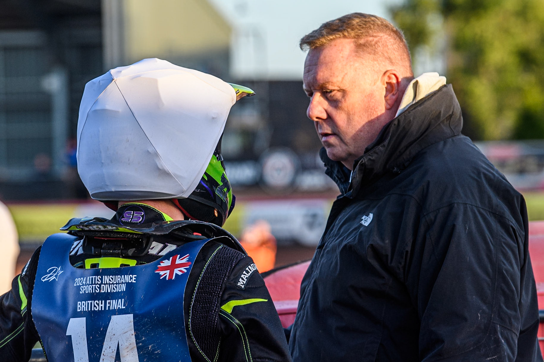 Tom Brennan (Left) with his advisor during the Attis Insurance Sports Division British Speedway Championship Final at the National Speedway Stadium, Manchester on Saturday 8th June 2024. (Photo: Ian Charles | MI News)