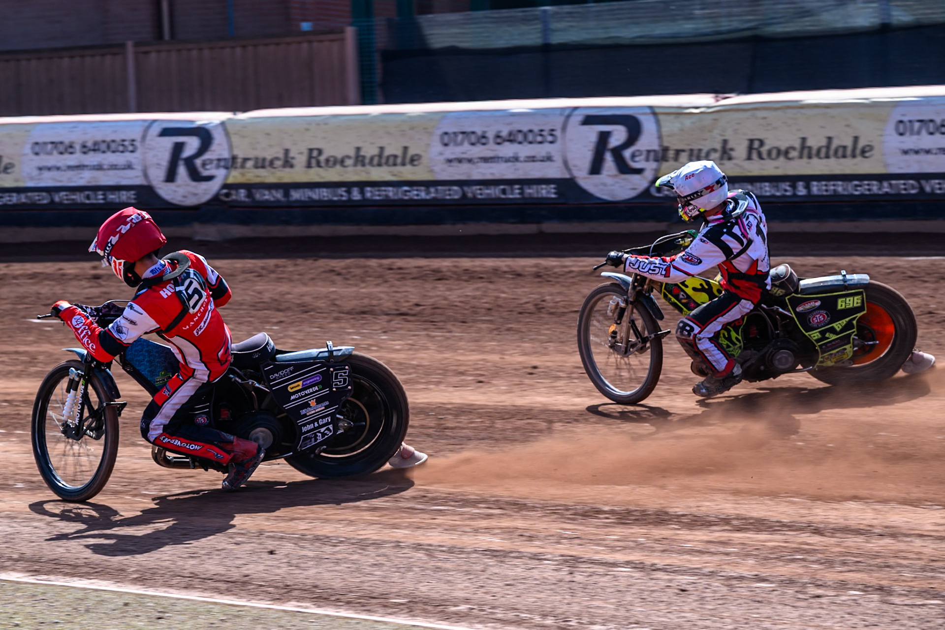 Freddy Hodder of Belle Vue Colts  in Red rides inside Ace Pijper of Middlesborough Tigers  in White during the WSRA National Development League match between Belle Vue Colts and Middlesbrough Tigers at the National Speedway Stadium, Manchester on Sunday 10th August 2025. (Photo: Mark Fletcher | MI News)