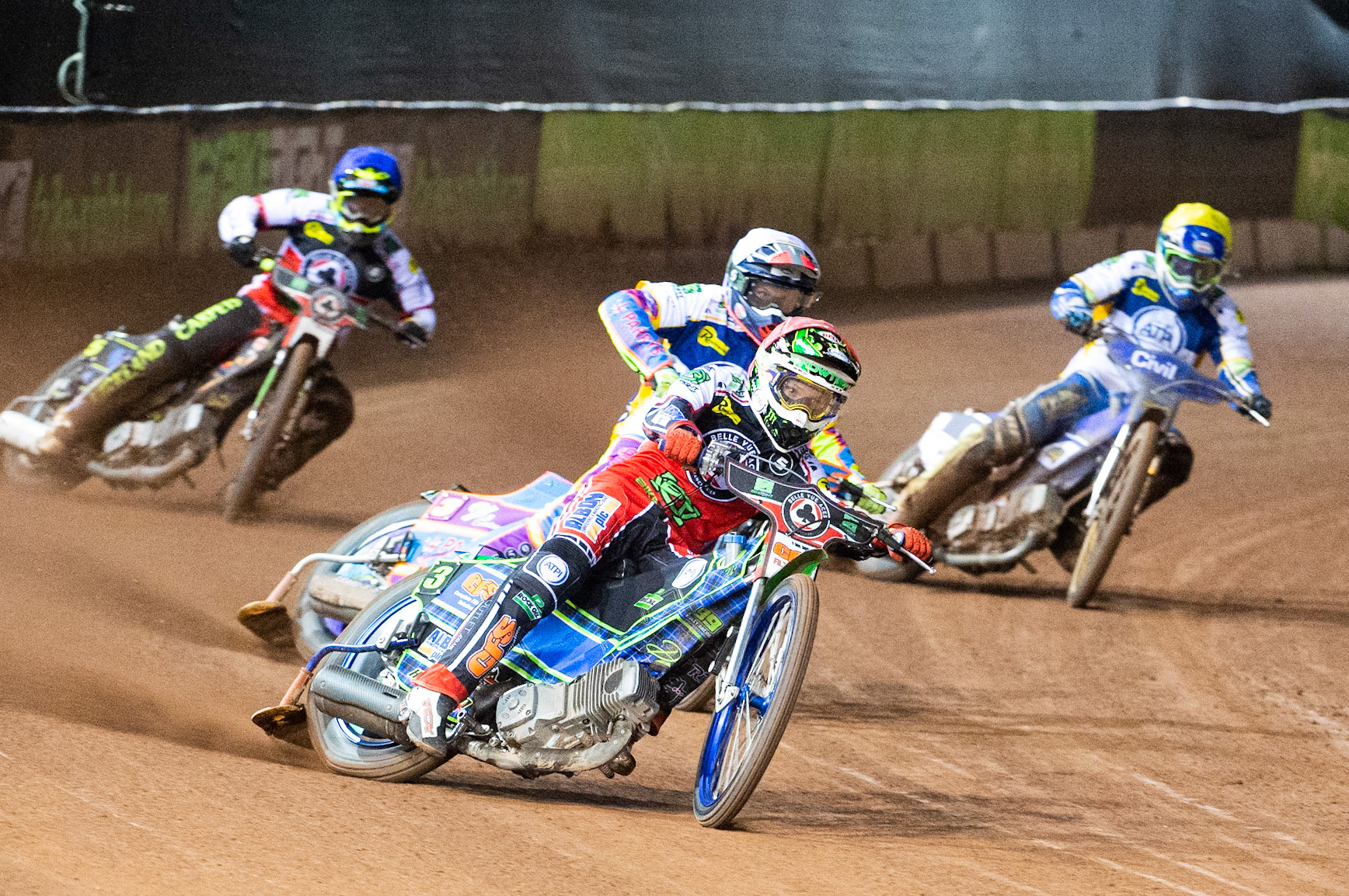 Photo: Ian CharlesDan Bewley of Belle Vue 'BikeRight' Aces  (Red) leads Rory Schlein of the 'ATPI' All Stars (White) with Kyle Bickley of Belle Vue 'BikeRight' Aces (Blue) and Richie Worrall of the 'ATPI' All Stars (Yellow)Belle Vue ‘Bikerite ’Aces v ‘ATPI’ All Stars, Premiership Challenge, National Speedway Stadium, Manchester Thursday  24  September  2020