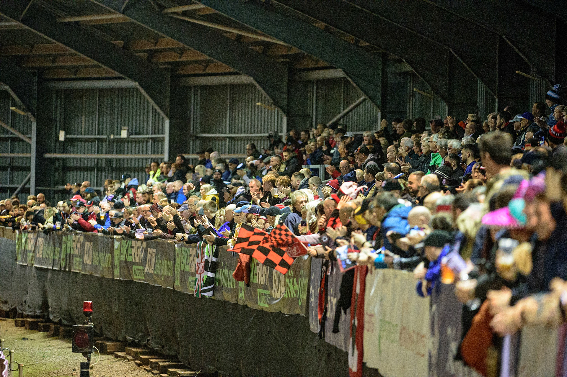 MANCHESTER, UK. OCT 11TH  Fans on the back straight during the SGB Premiership Grand Final 1st Leg between Belle Vue Aces and Peterborough Panthers at the National Speedway Stadium, Manchester on Monday 11th October 2021. (Credit: Ian Charles | MI News)