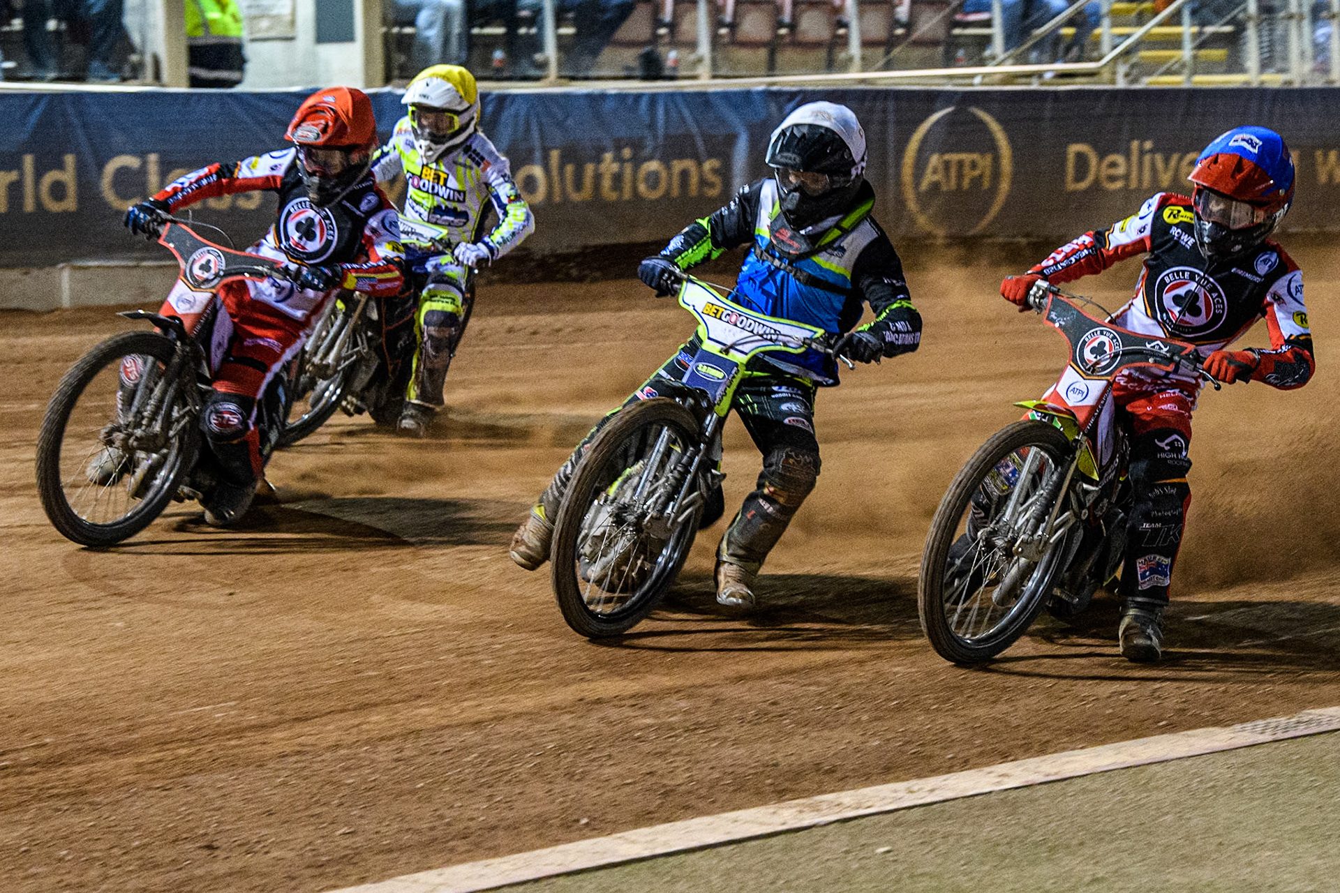Belle Vue Aces' Tate Zischke in Blue rides inside Oxford Spires' Guest Rider Dan Thompson in White, Belle Vue Aces' Zack Cook in Red  with Oxford Spires' Luke Killeen behind during the Rowe Motor Oil Premiership match between Belle Vue Aces and Oxford Spires at the National Speedway Stadium, Manchester on Monday 14th April 2025. (Photo: Ian Charles | MI News)