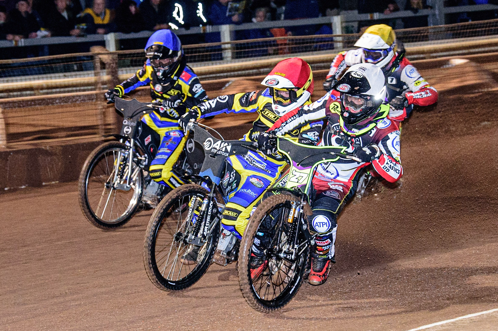 Tom Brennan  (White) inside Lewis Kerr (Red), Dan Gilkes  (Blue) with Jake Mulford  (Yellow) behind during the Sheffield Tigers vs Belle Vue Aces meeting in the SGP Premiership at Owlerton Stadium, Sheffield on Thursday 23rd March 2023. (Photo: Ian Charles | MI News)